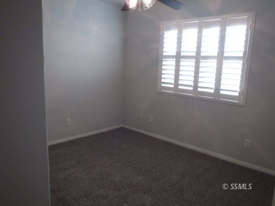 421 Marlene Court Ridgecrest, CA 93555 - Photo 30 of 50 an empty room with a window