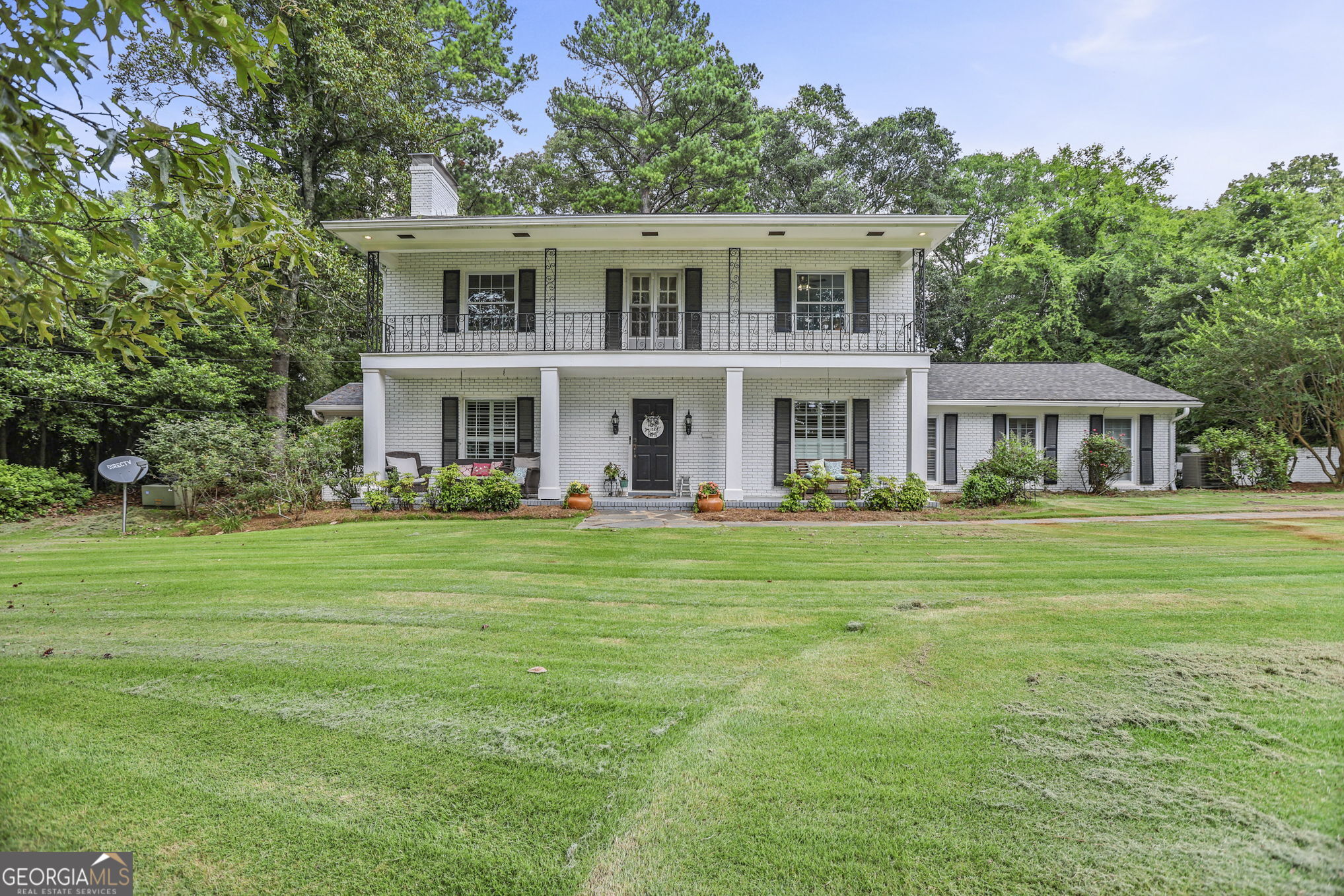 420 Ridgecrest Road LaGrange, GA 30240 - Photo 1 of 48 a front view of a house with a garden