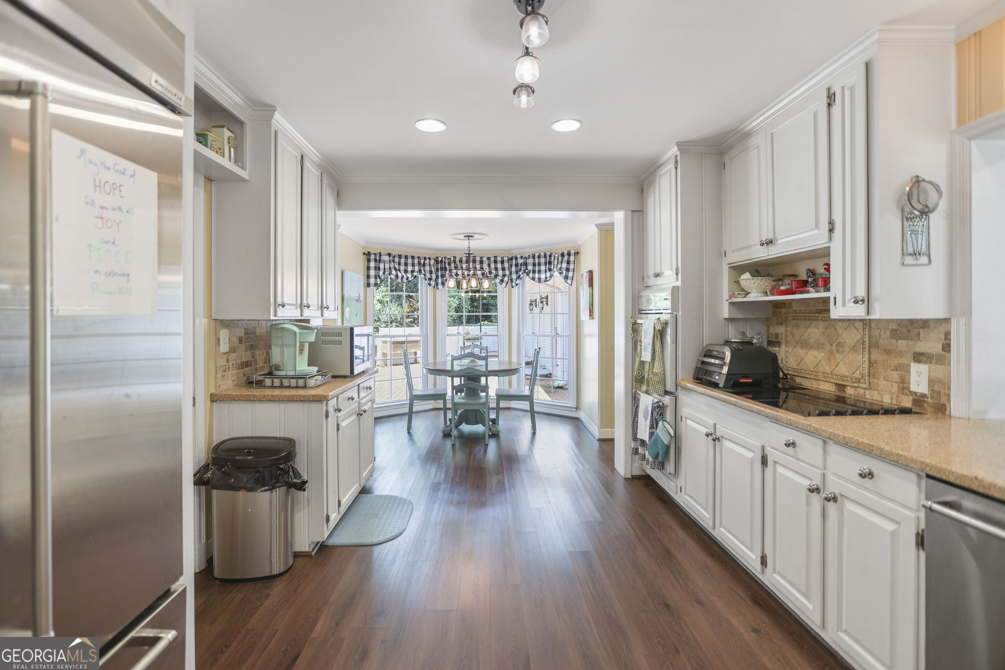 420 Ridgecrest Road LaGrange, GA 30240 - Photo 17 of 48 a kitchen with sink cabinets and wooden floor