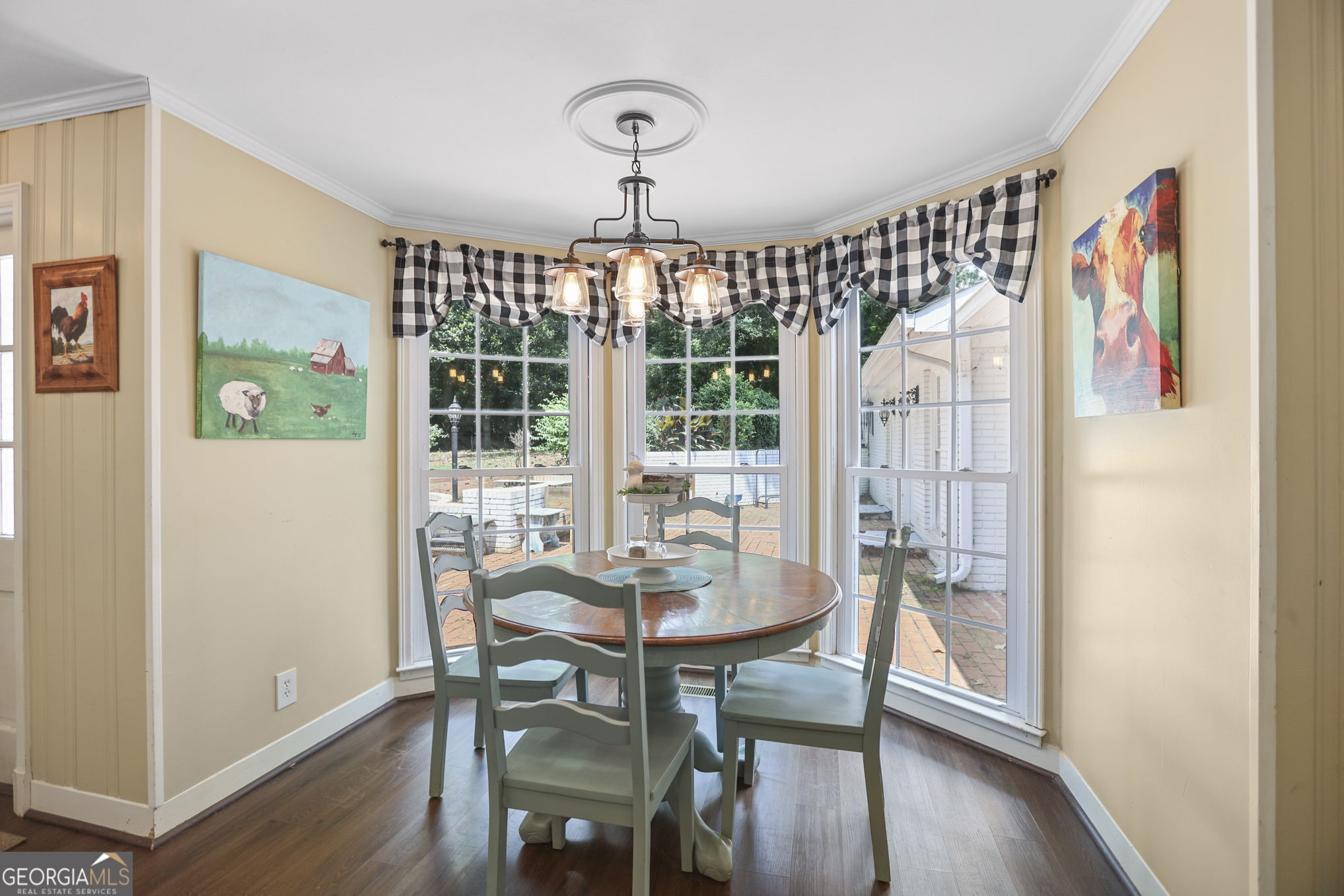 420 Ridgecrest Road LaGrange, GA 30240 - Photo 18 of 48 a view of a dining room with furniture window and wooden floor