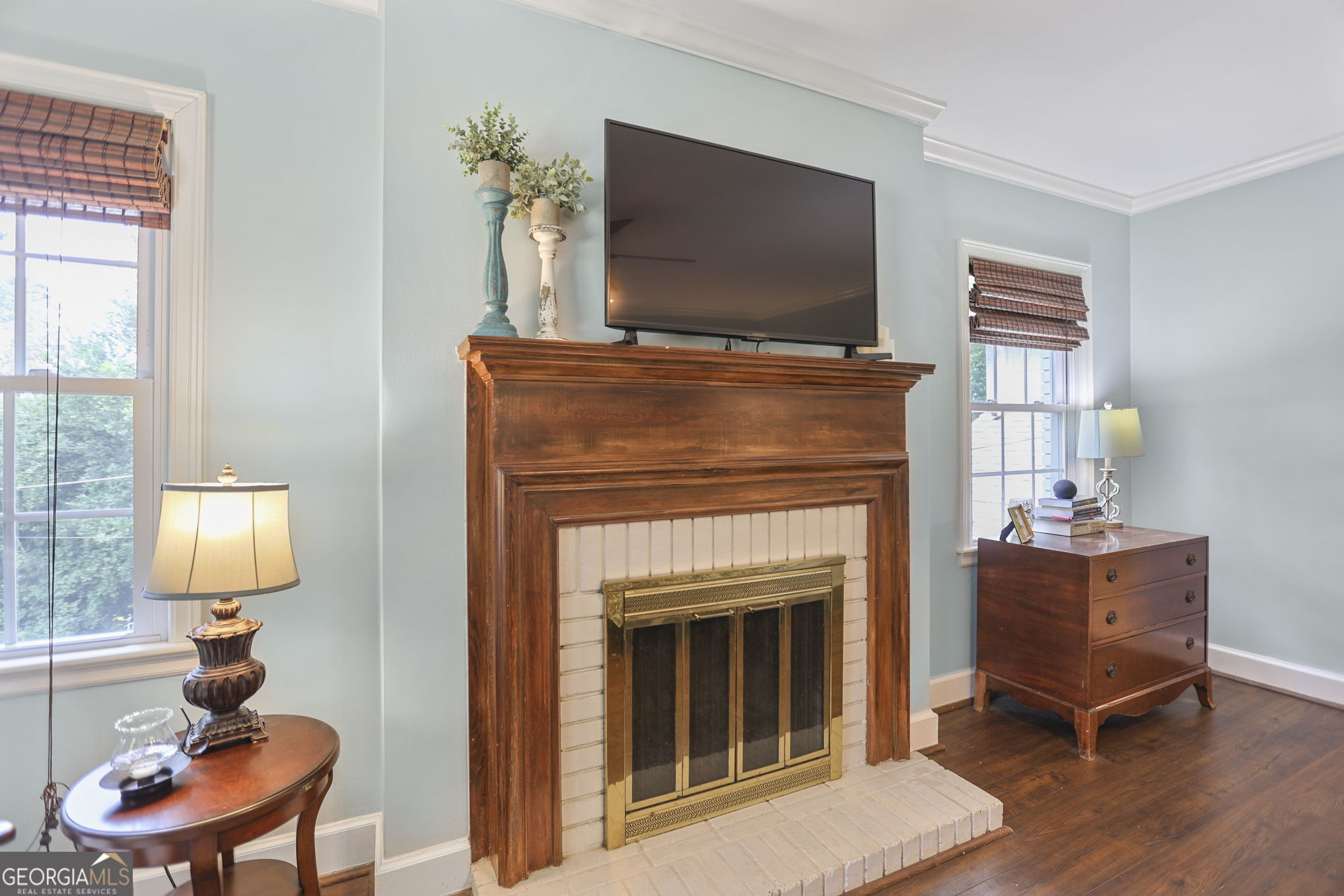 420 Ridgecrest Road LaGrange, GA 30240 - Photo 21 of 48 a living room with furniture and a fireplace