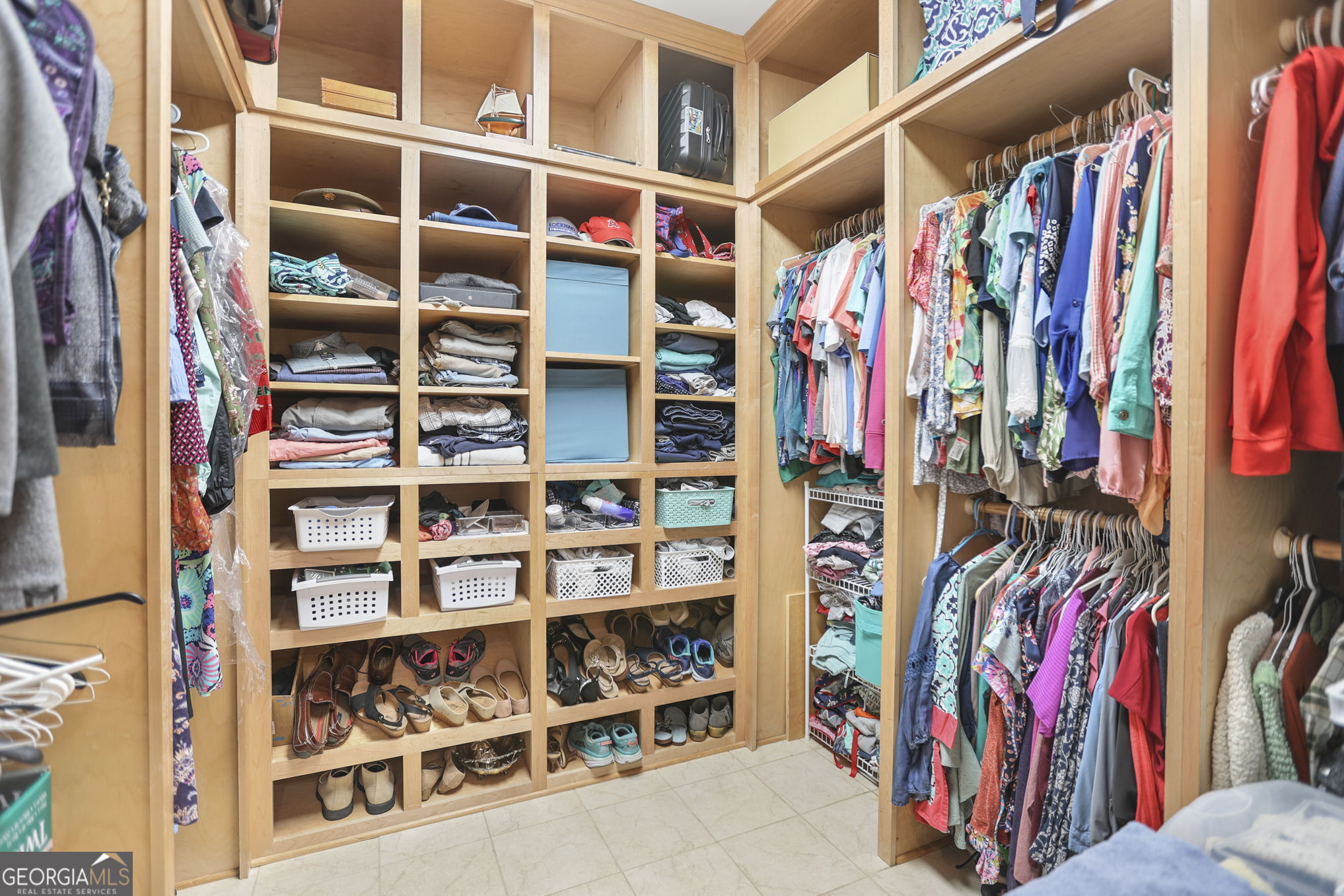 420 Ridgecrest Road LaGrange, GA 30240 - Photo 25 of 48 a view of walk in closet with clothes and shoes