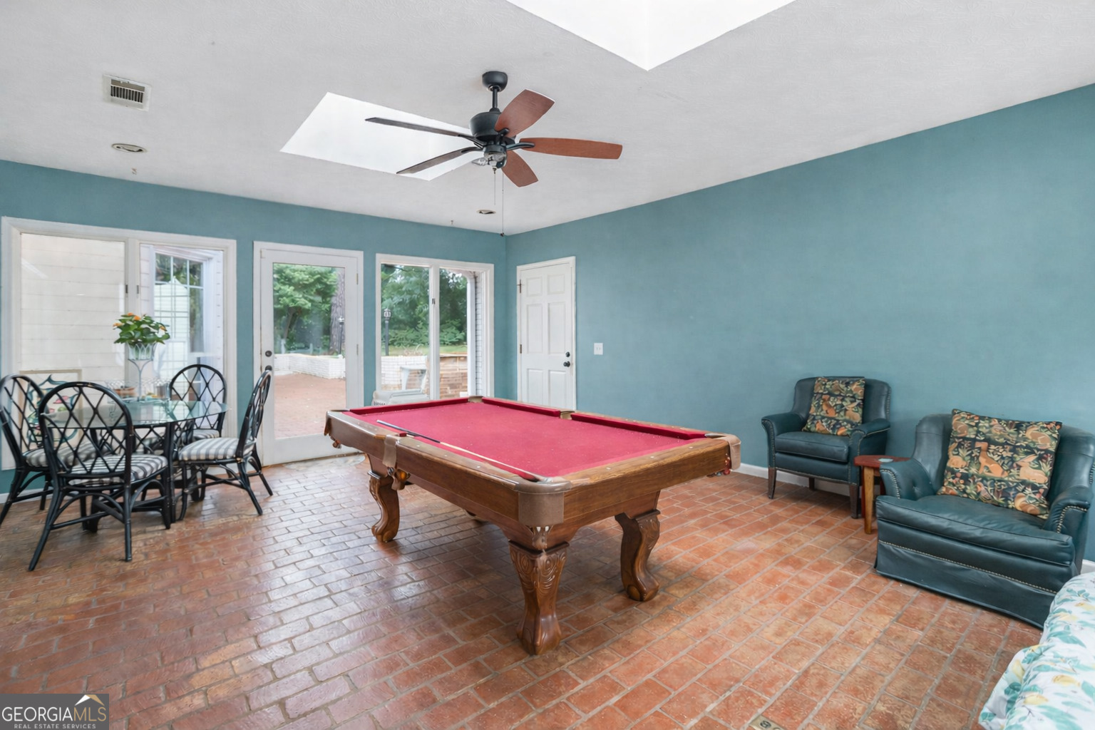 420 Ridgecrest Road LaGrange, GA 30240 - Photo 30 of 48 a living room with furniture a rug and a chandelier