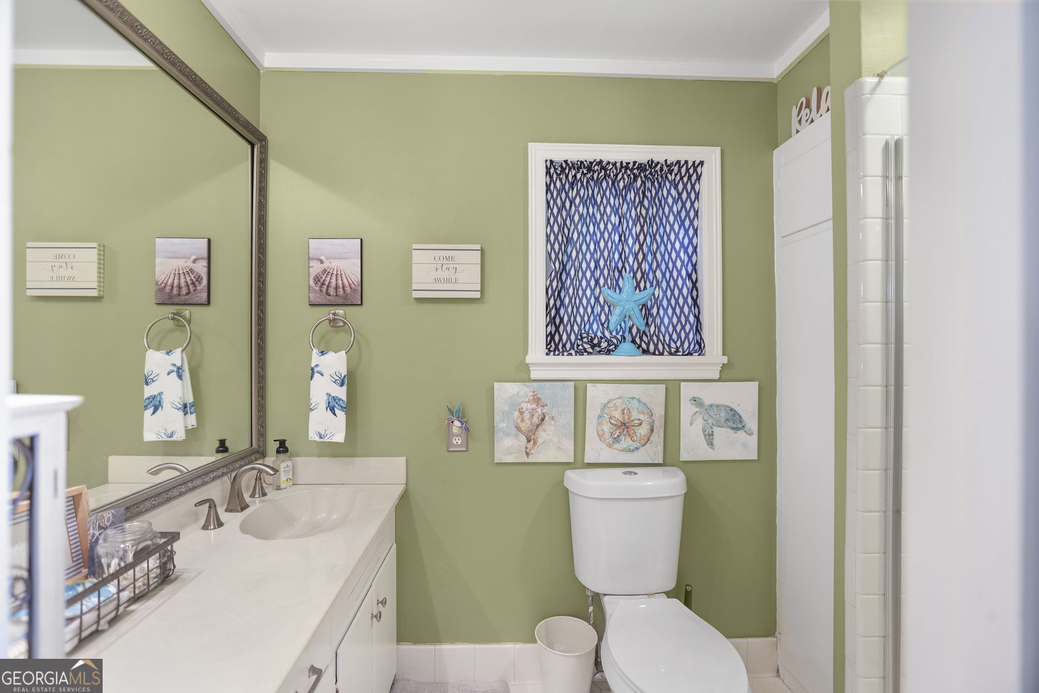 420 Ridgecrest Road LaGrange, GA 30240 - Photo 33 of 48 a bathroom with a toilet sink and mirror