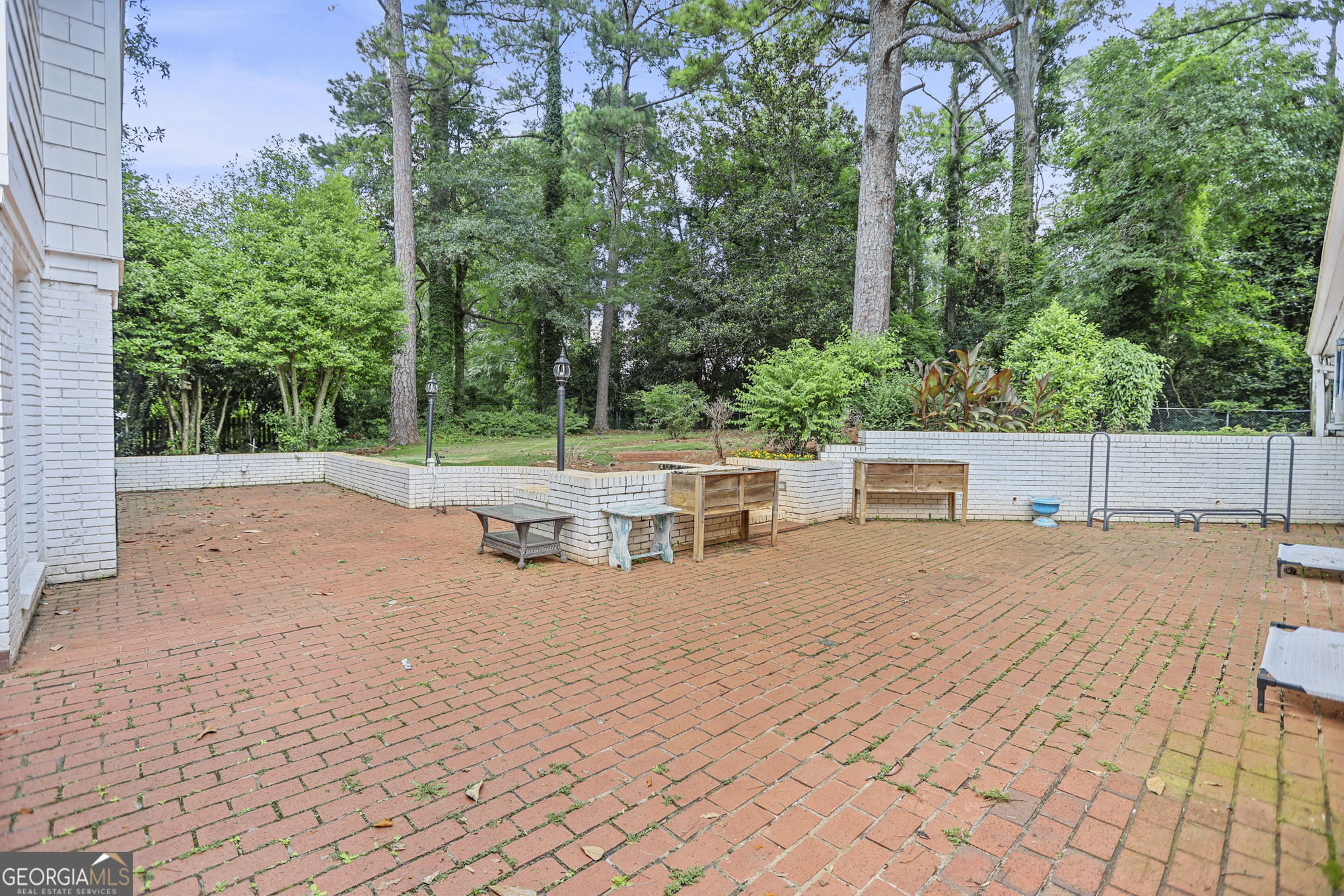 420 Ridgecrest Road LaGrange, GA 30240 - Photo 43 of 48 a lawn chairs sitting in a yard with large trees