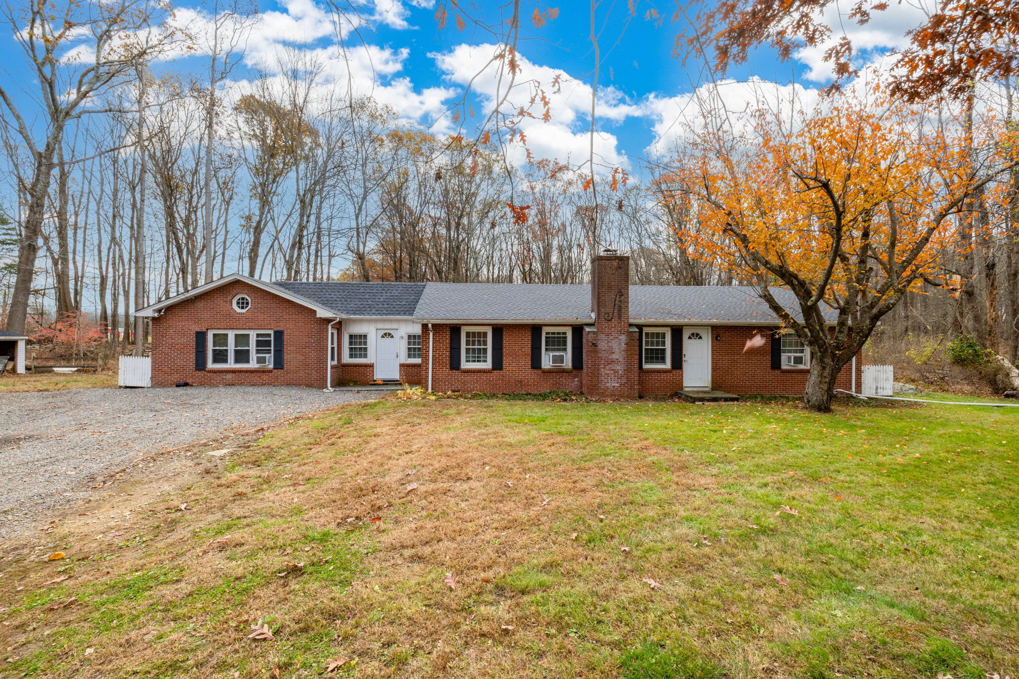 a house with trees in front of it