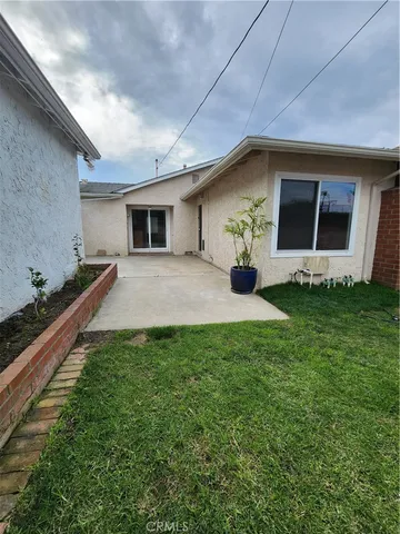 a house view with a garden space