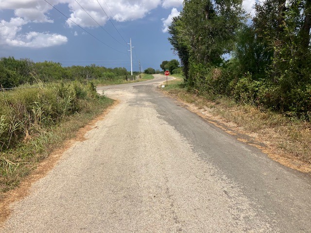 -38ac Gander Slough Road Kingsbury, TX 78638 - Photo 11 of 11 a view of a yard with a house