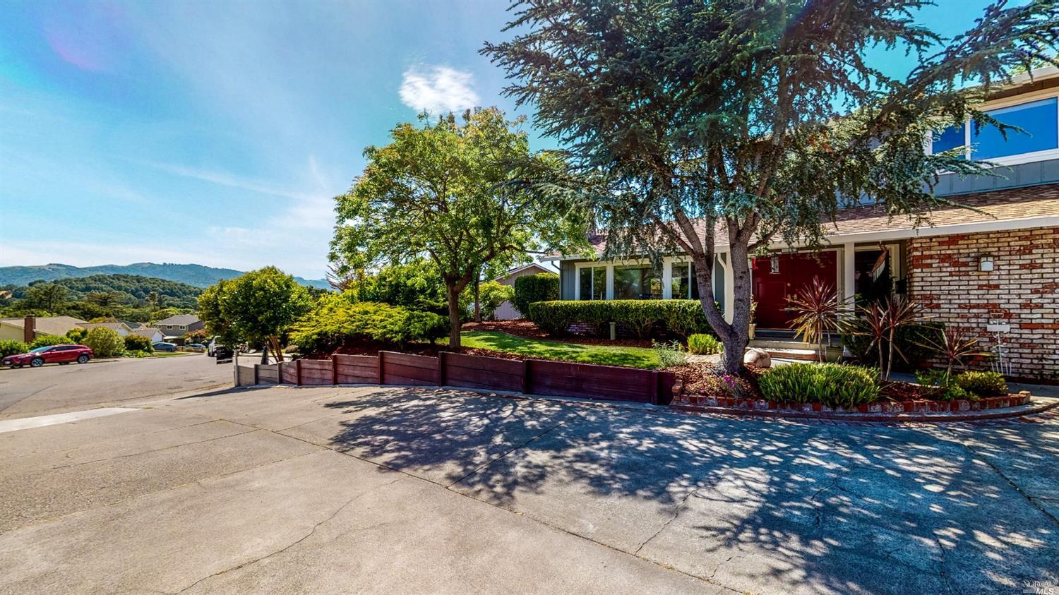 33 Manzano Court Novato, CA 94945 - Photo 1 of 1 a view of a backyard with plants and a patio