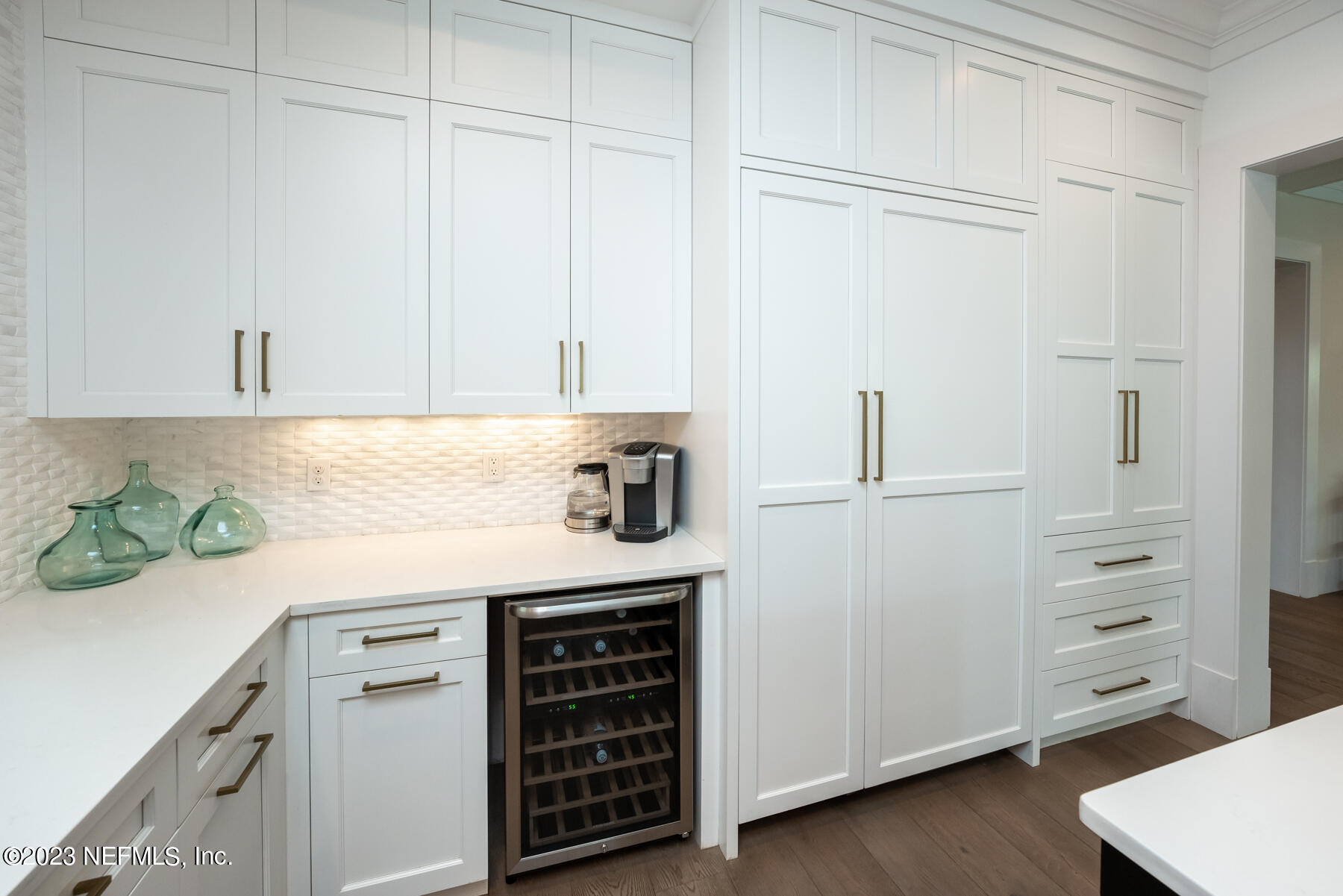 357 11th Street Atlantic Beach, FL 32233 - Photo 12 of 47 a kitchen with a white cabinets and a stove