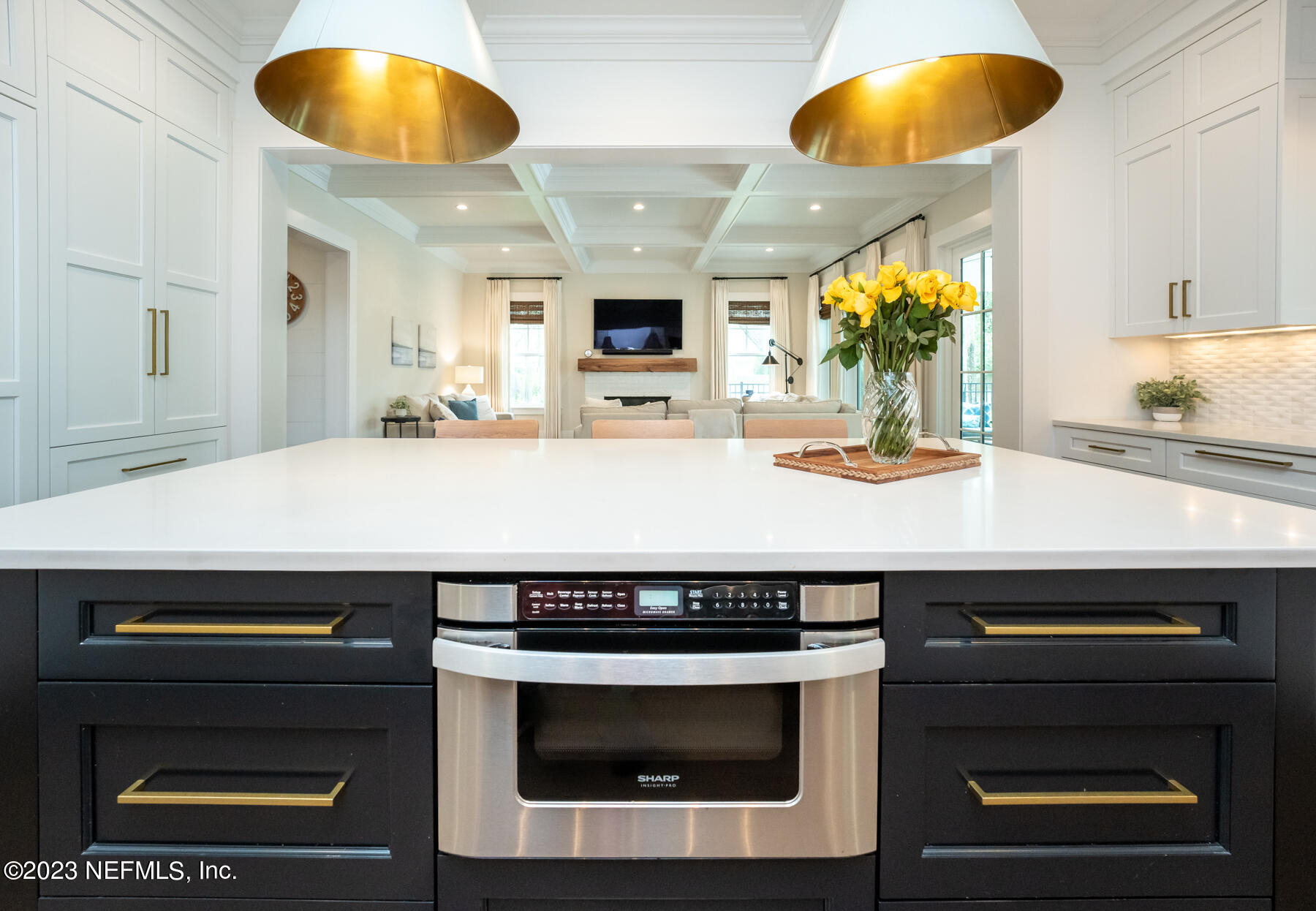 357 11th Street Atlantic Beach, FL 32233 - Photo 13 of 47 a kitchen with a sink a stove and a microwave