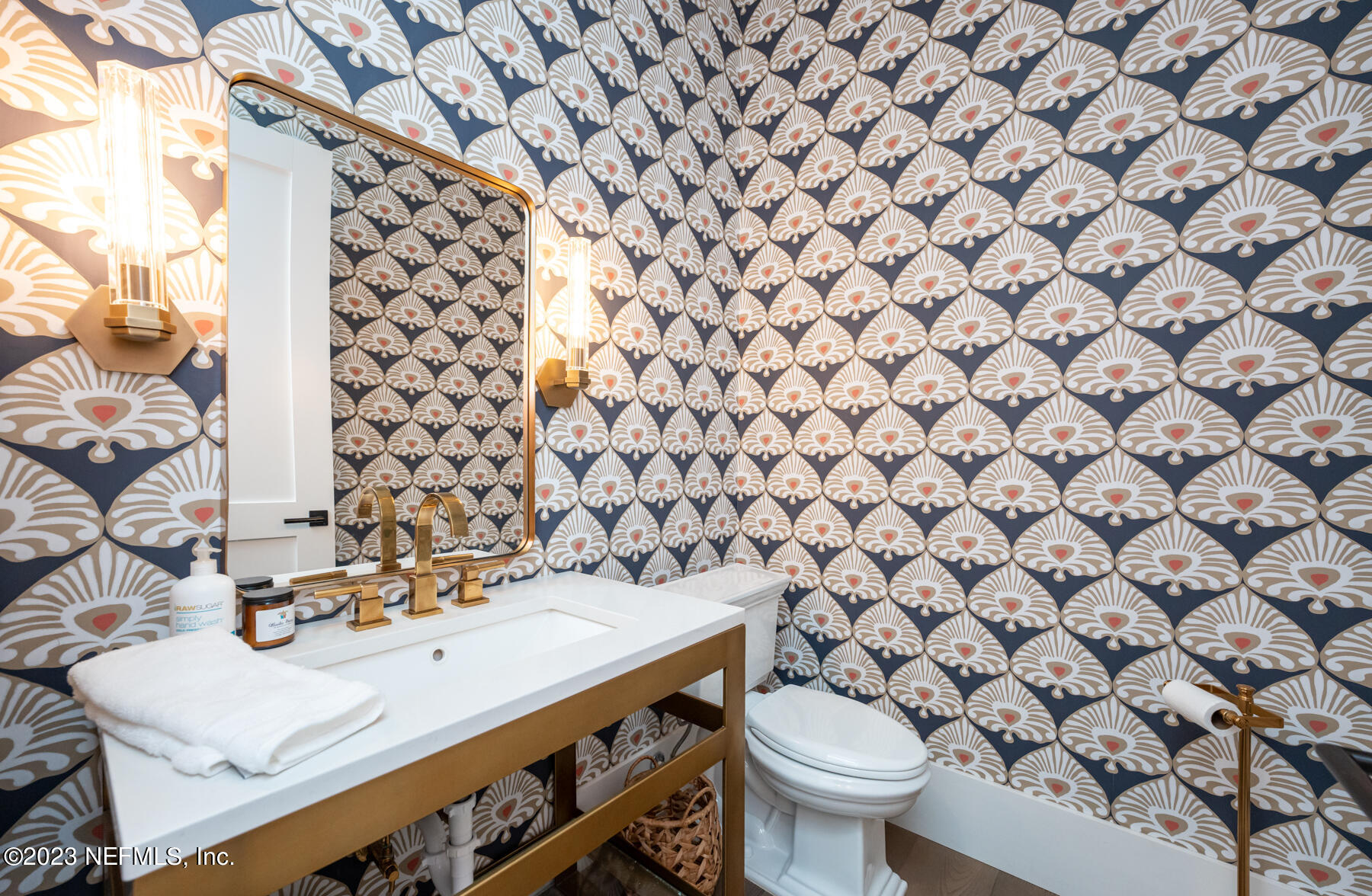 357 11th Street Atlantic Beach, FL 32233 - Photo 16 of 47 a bathroom with a sink and a toilet