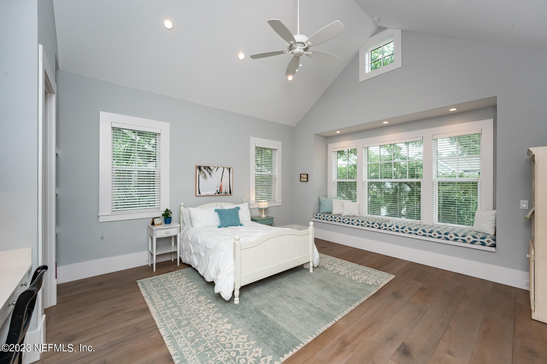 357 11th Street Atlantic Beach, FL 32233 - Photo 23 of 47 a bedroom with a large bed and a window