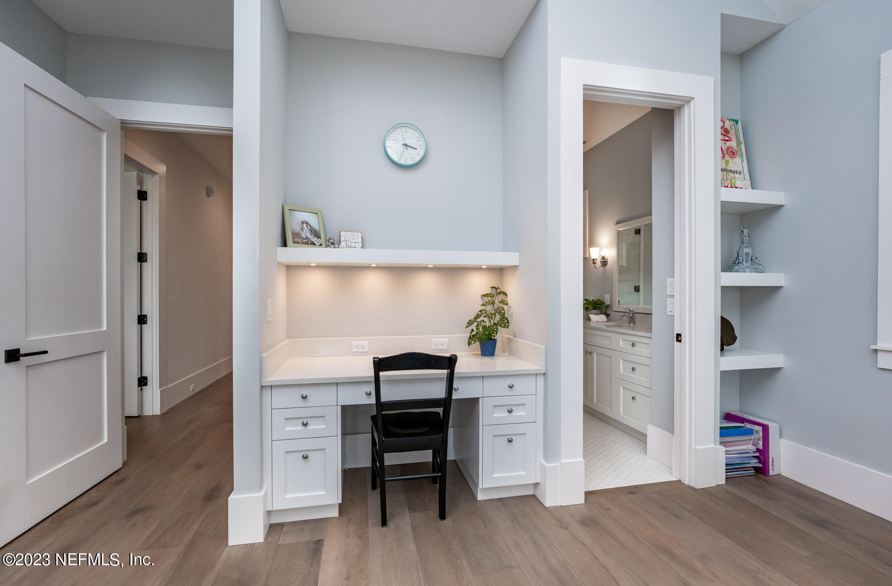 357 11th Street Atlantic Beach, FL 32233 - Photo 24 of 47 wooden floor and chair in a room