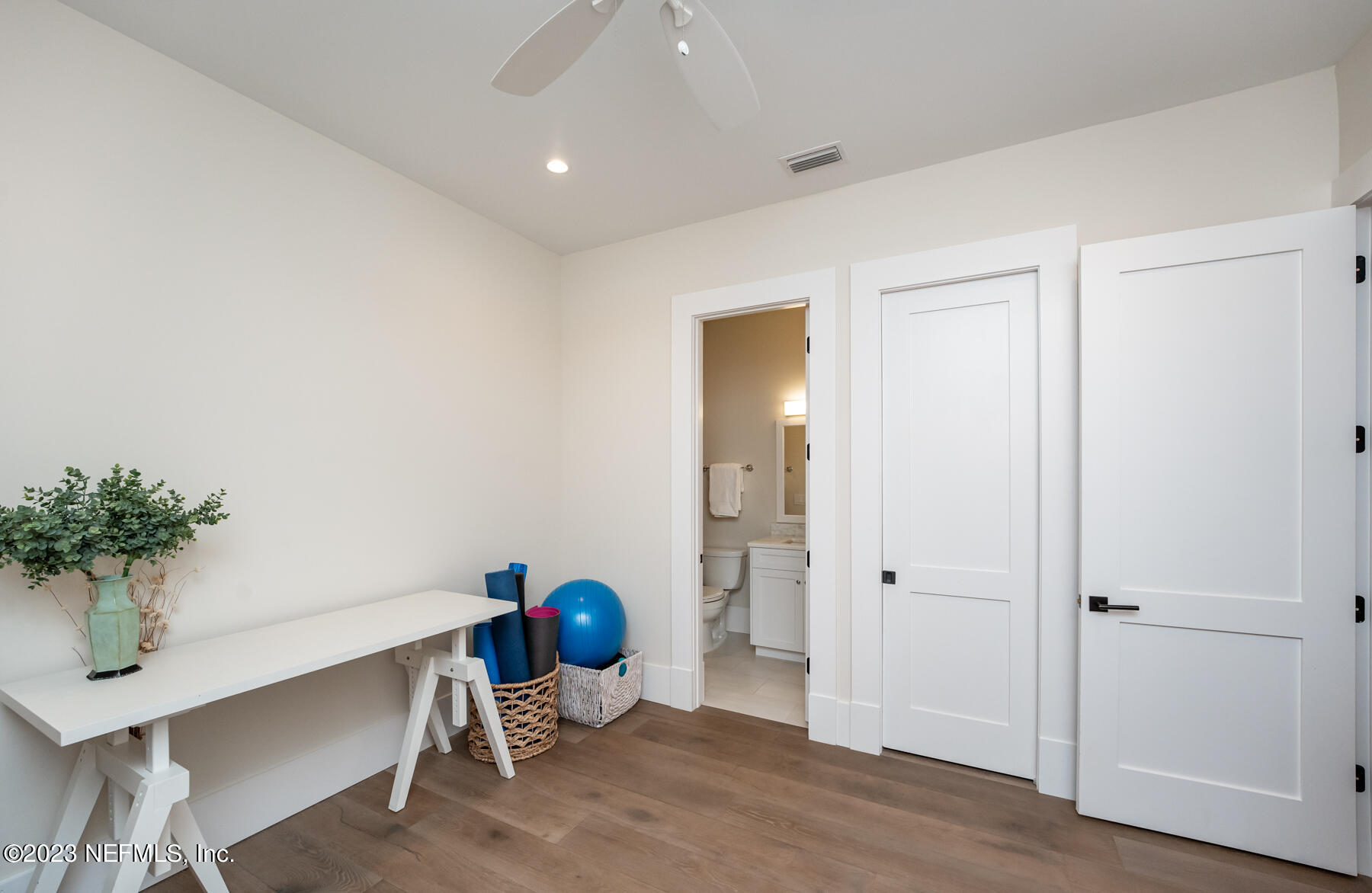 357 11th Street Atlantic Beach, FL 32233 - Photo 28 of 47 a view of workspace with furniture and wooden floor