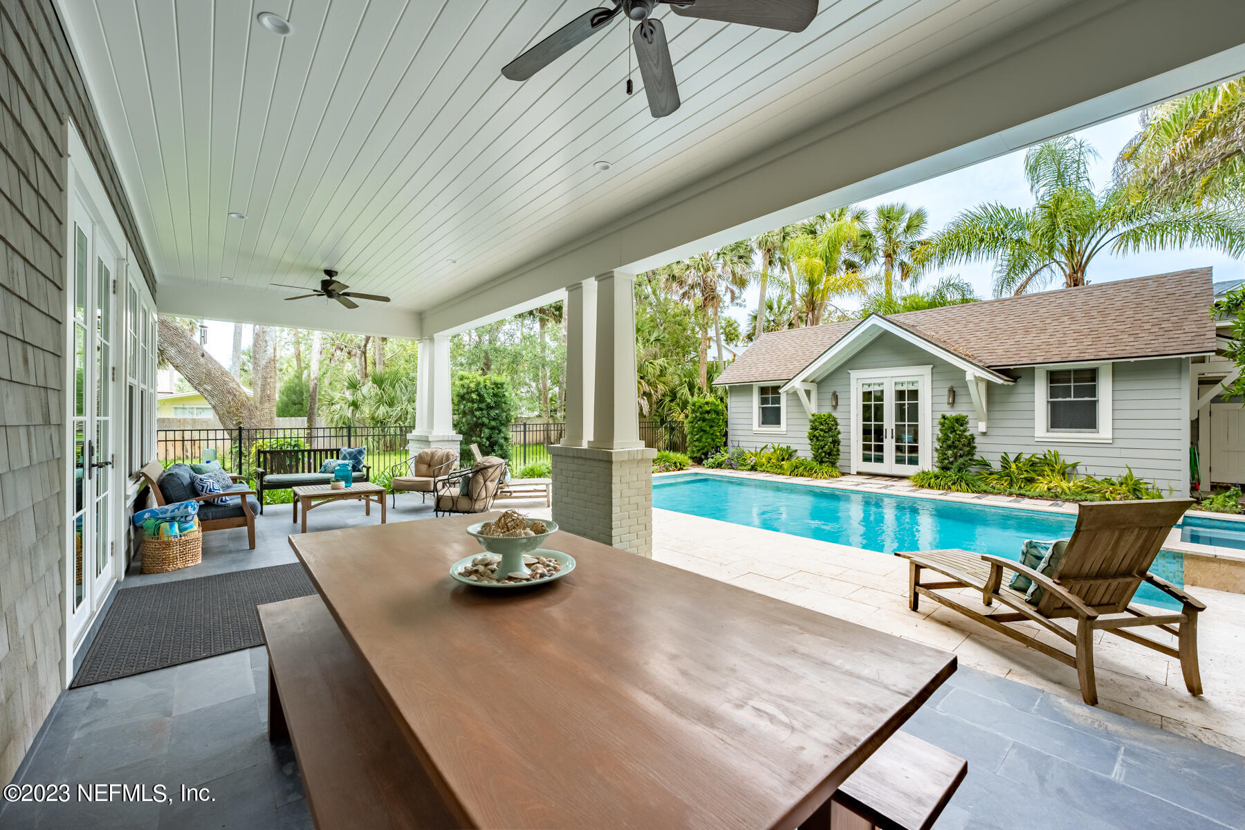 357 11th Street Atlantic Beach, FL 32233 - Photo 33 of 47 a view of a patio with couches chairs and potted plants