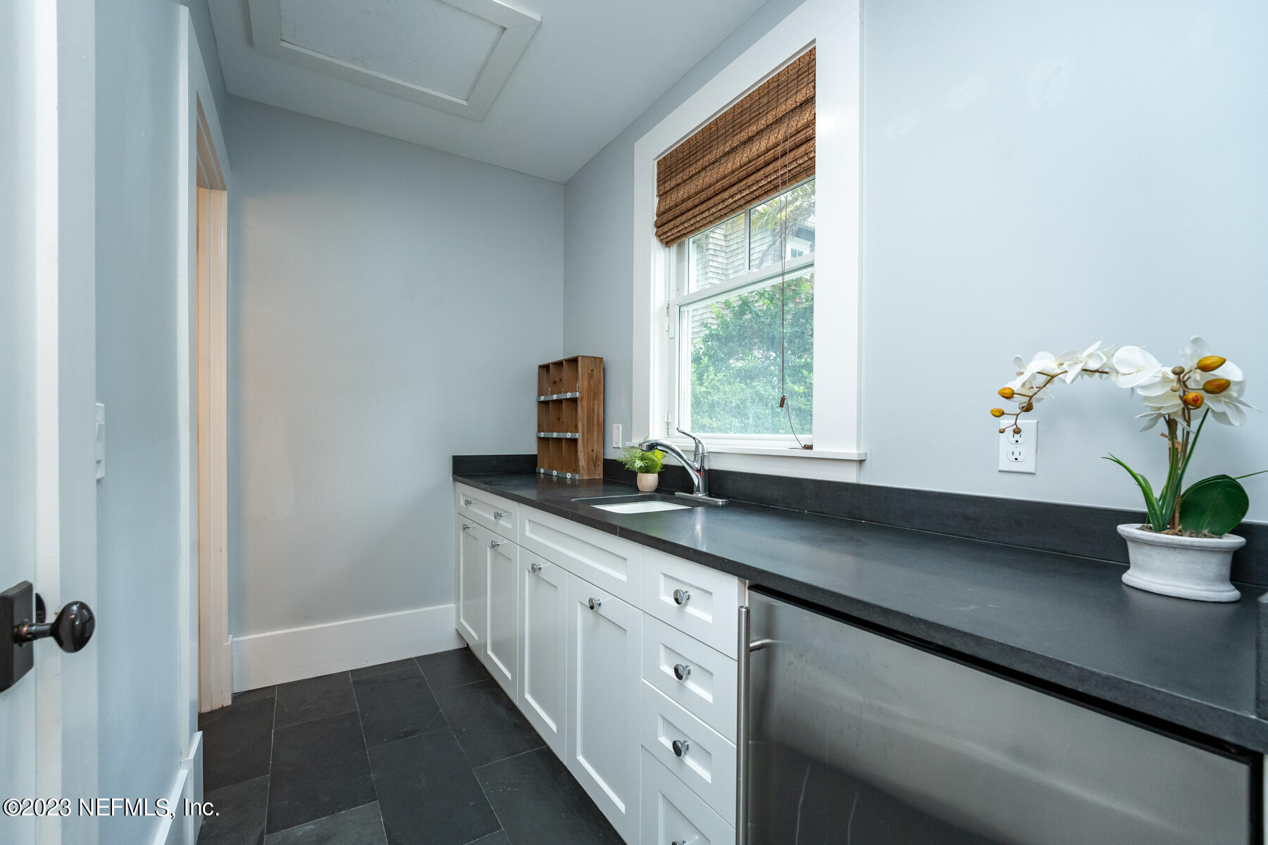 357 11th Street Atlantic Beach, FL 32233 - Photo 41 of 47 a kitchen with sink and window