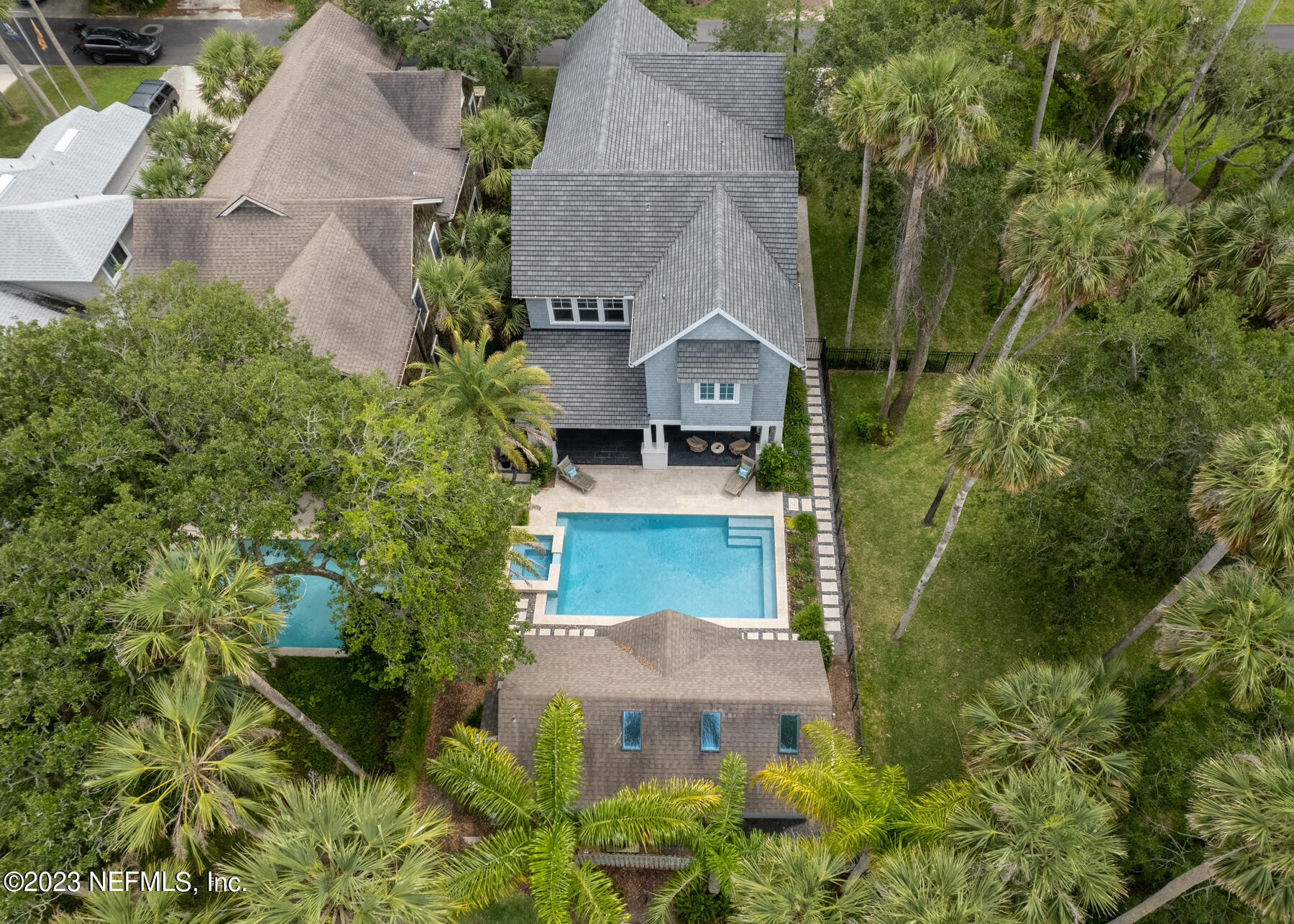 357 11th Street Atlantic Beach, FL 32233 - Photo 44 of 47 an aerial view of a house with yard and trees