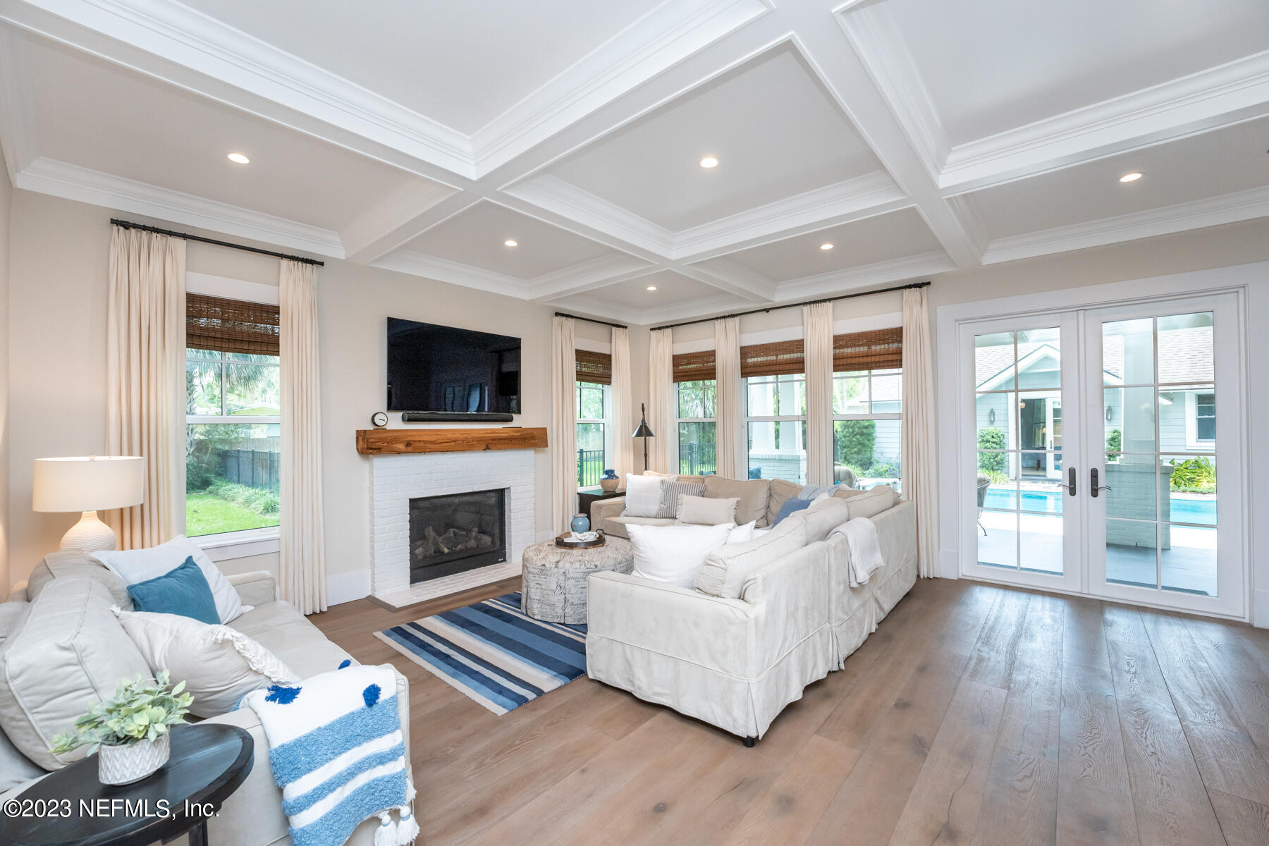 357 11th Street Atlantic Beach, FL 32233 - Photo 7 of 47 a living room with furniture fireplace and flat screen tv