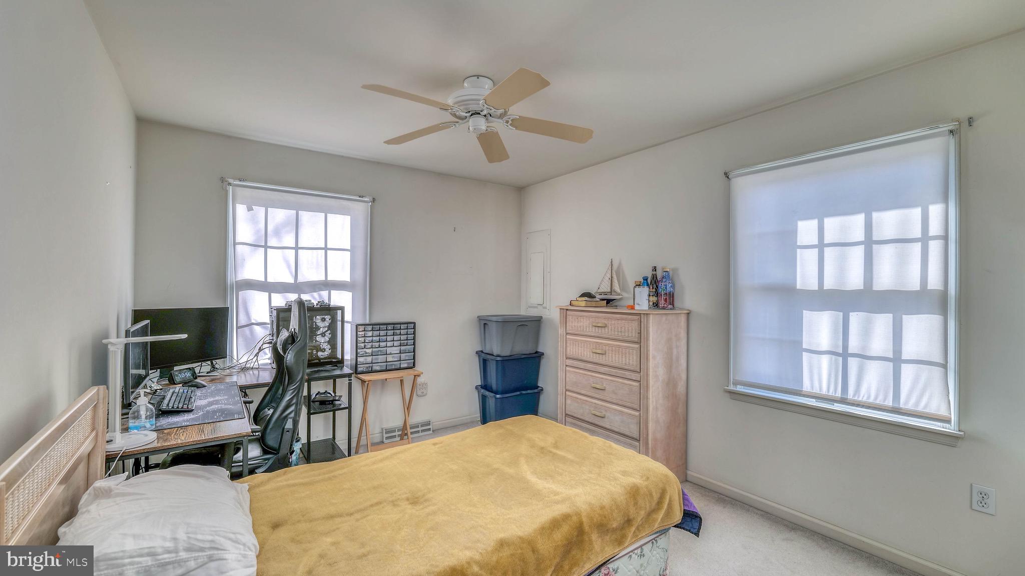 530 North Shore Road Marmora, NJ 08223 - Photo 14 of 31 a bed room with a bed and furniture