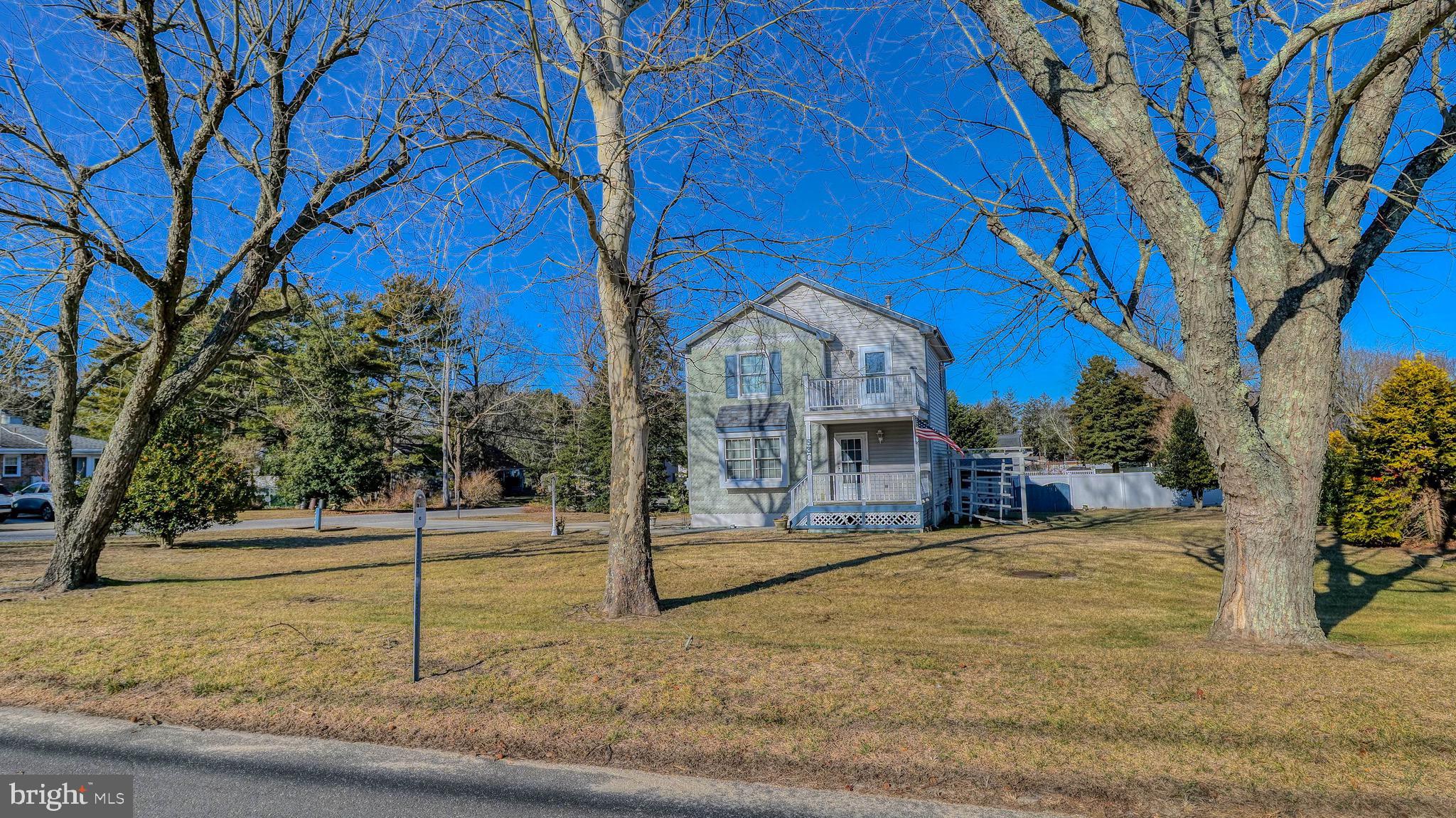 530 North Shore Road Marmora, NJ 08223 - Photo 21 of 31 a view of a house with snow on the road