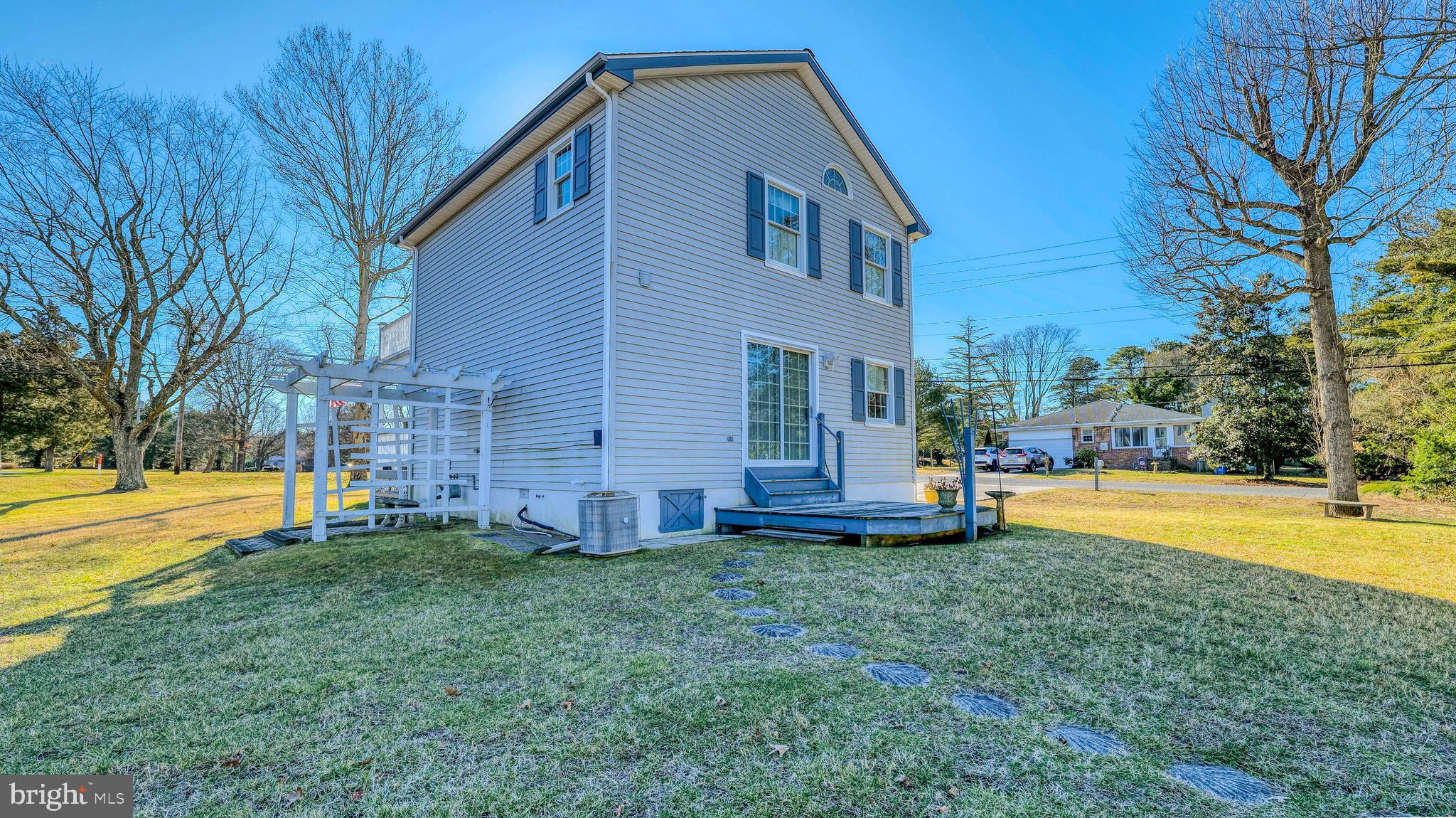 530 North Shore Road Marmora, NJ 08223 - Photo 23 of 31 a view of a house with a yard