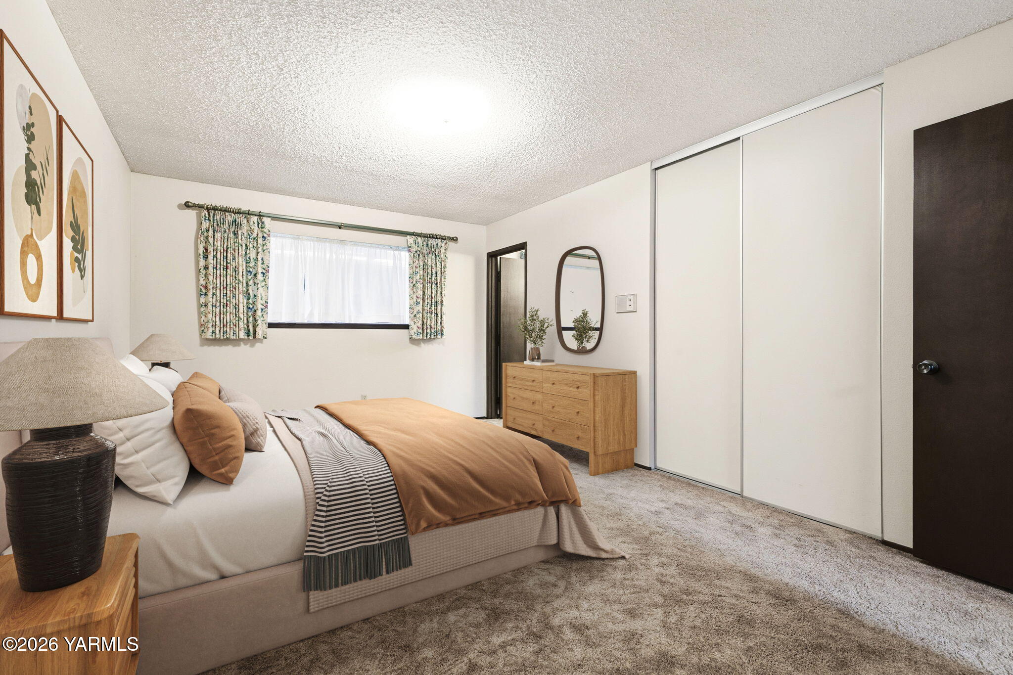 5901 Barge Street, Unit 43 Yakima, WA 98908 - Photo 13 of 22 a bedroom with a bed and window