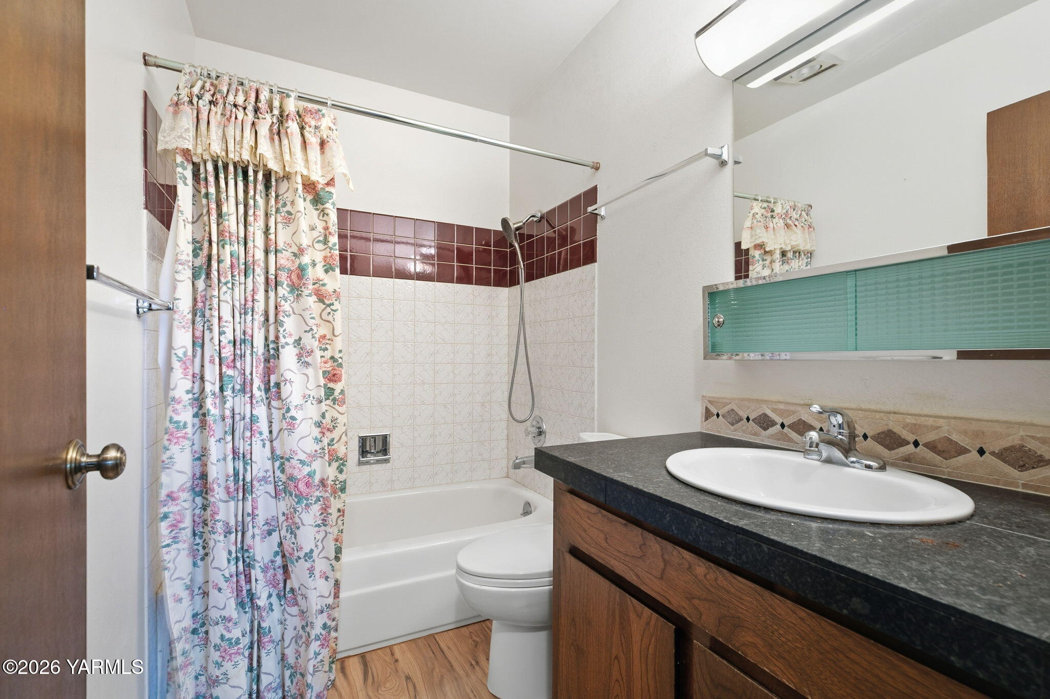 5901 Barge Street, Unit 43 Yakima, WA 98908 - Photo 18 of 22 a bathroom with a granite countertop sink toilet and shower