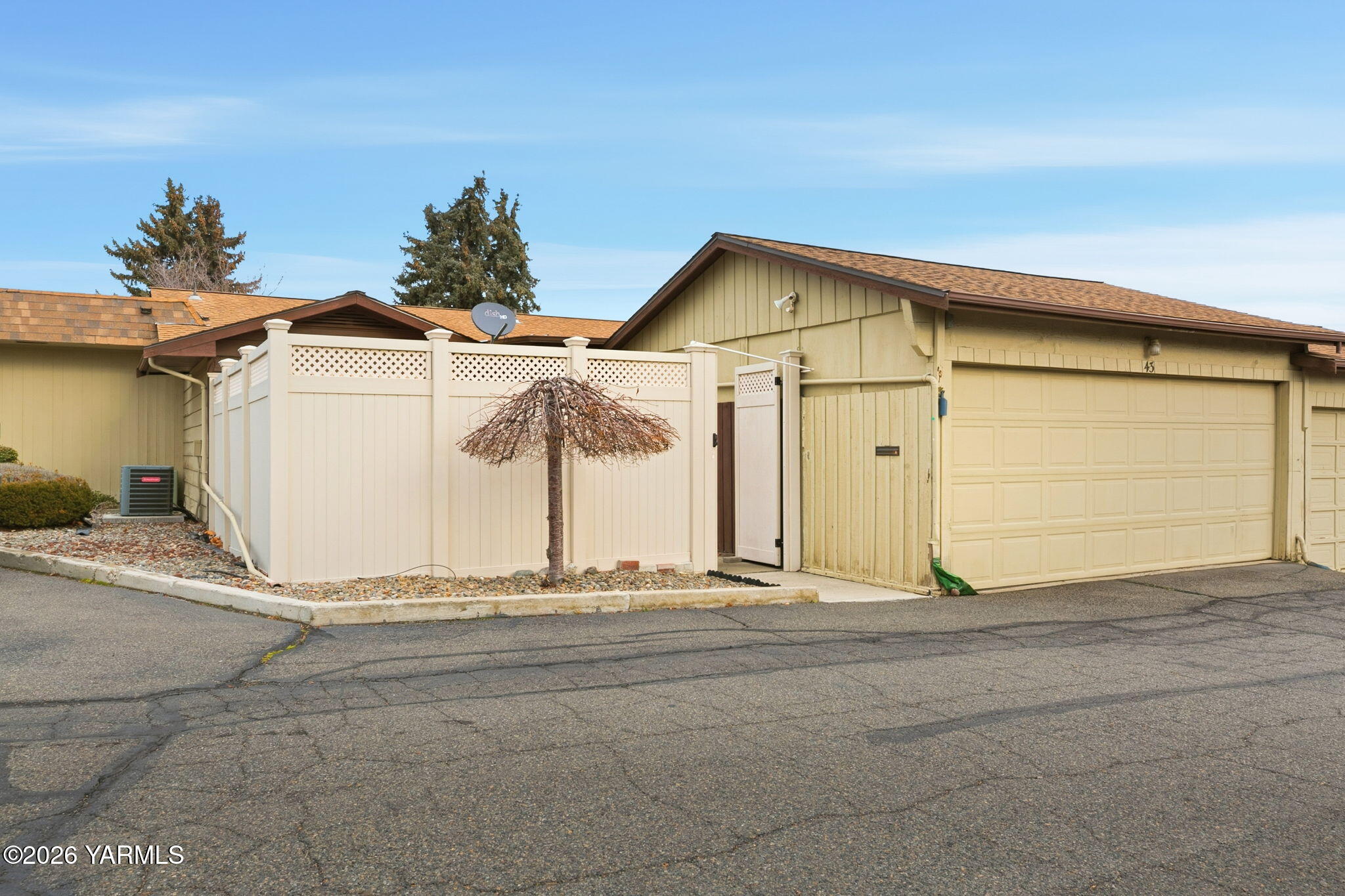 5901 Barge Street, Unit 43 Yakima, WA 98908 - Photo 22 of 22 a view of a house with a yard