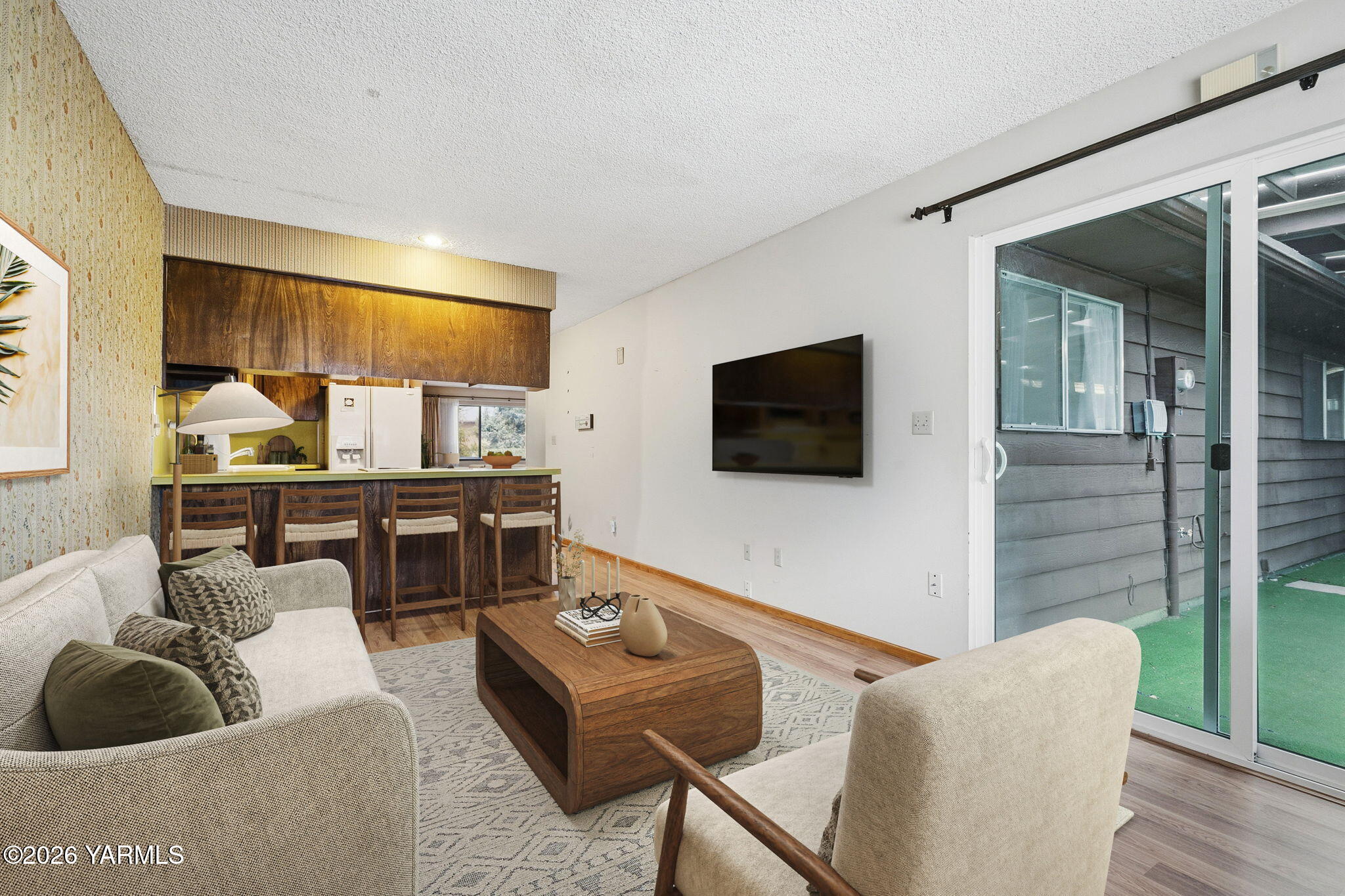 5901 Barge Street, Unit 43 Yakima, WA 98908 - Photo 9 of 22 a living room with furniture and a flat screen tv