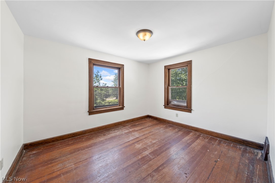 317 Ruckel Road Akron, OH 44305 - Photo 14 of 30 Unfurnished room featuring dark hardwood / wood-style flooring