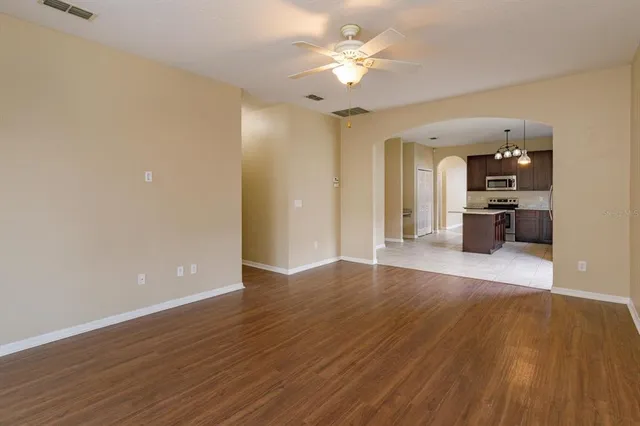 a view of a kitchen with a sink and a stove