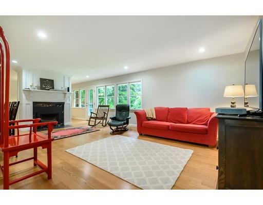 5 Lantern Road Andover, MA 01810 - Photo 8 of 32 a living room with furniture and a fireplace