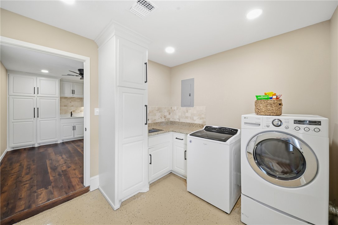 4608 Union Road North Zulch, TX 77872 - Photo 17 of 35 a view of storage and utility room with washer and dryer