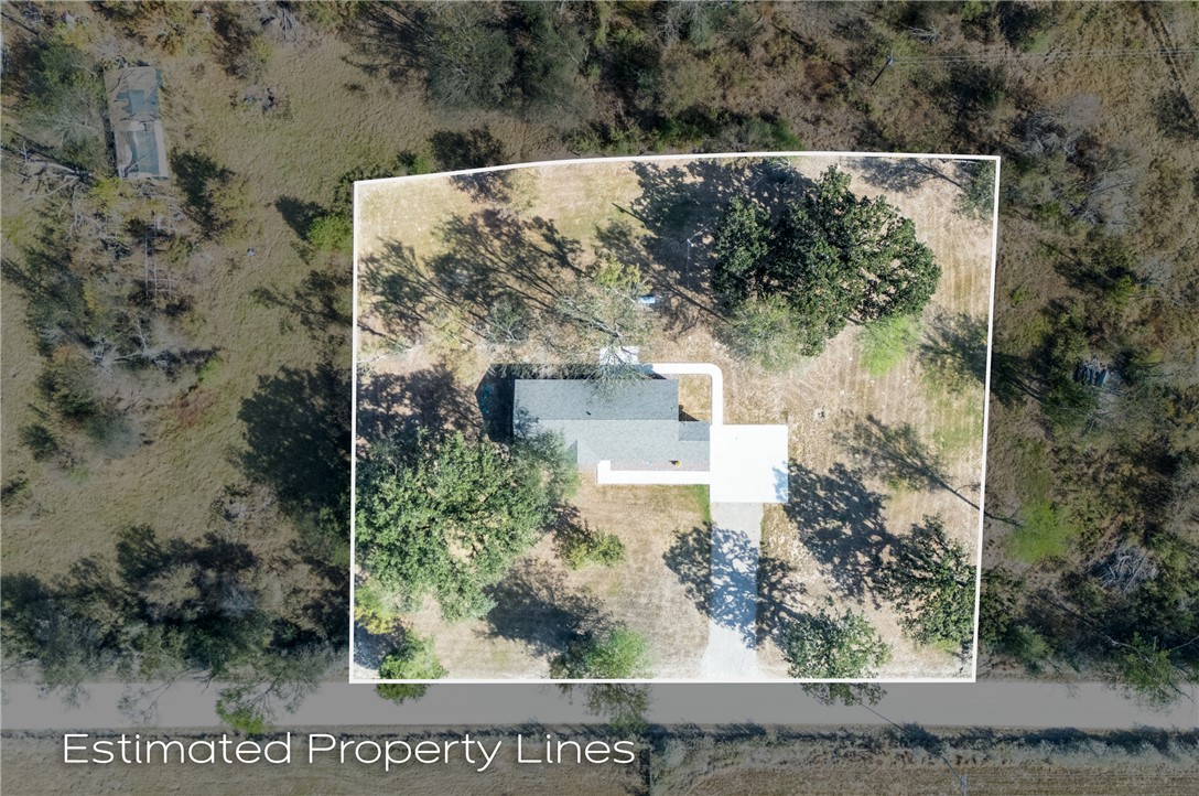 4608 Union Road North Zulch, TX 77872 - Photo 2 of 35 an aerial view of a house with a yard