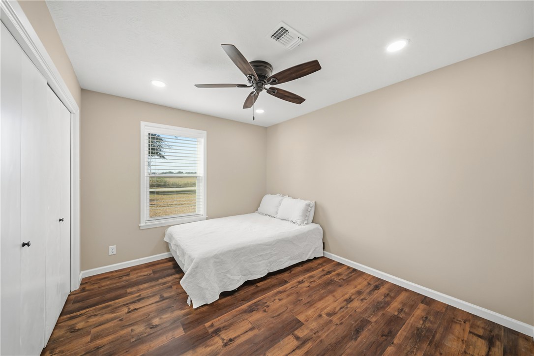 4608 Union Road North Zulch, TX 77872 - Photo 23 of 35 a bedroom with a bed and window