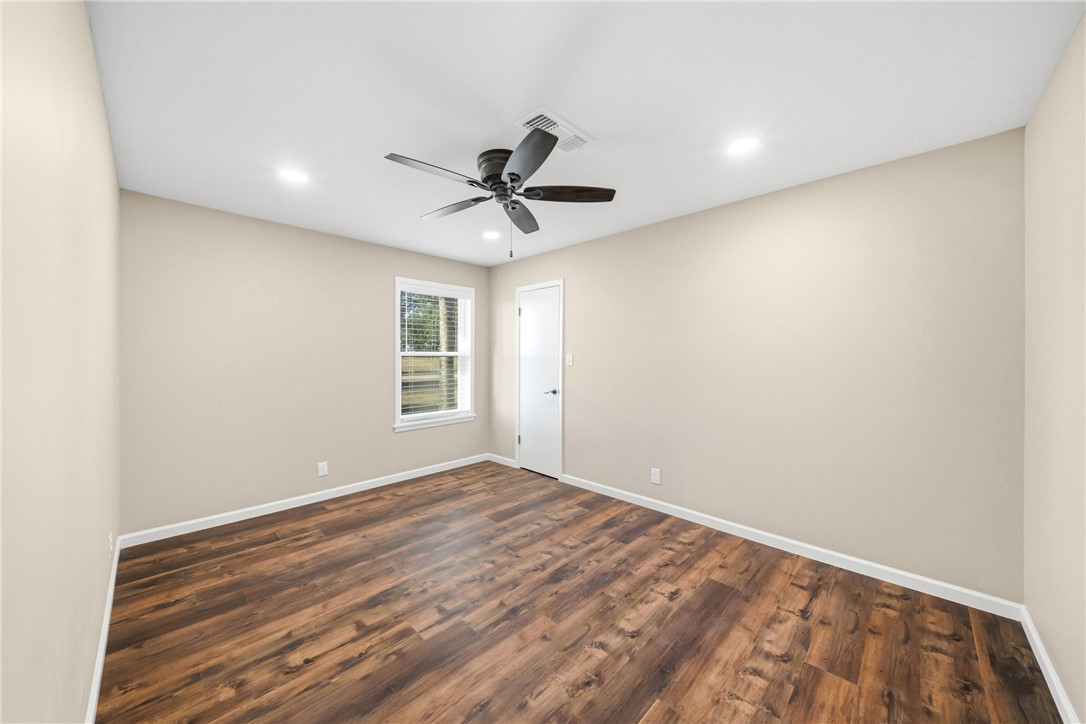 4608 Union Road North Zulch, TX 77872 - Photo 24 of 35 a view of room with window and ceiling fan