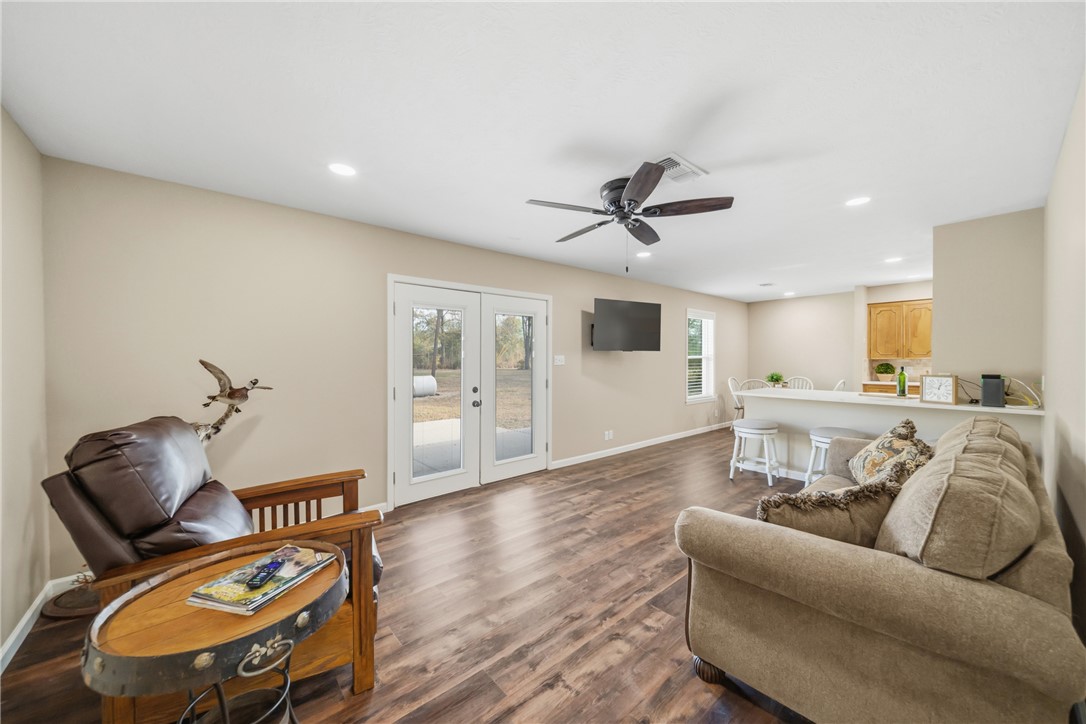 4608 Union Road North Zulch, TX 77872 - Photo 9 of 35 a living room with furniture and wooden floor