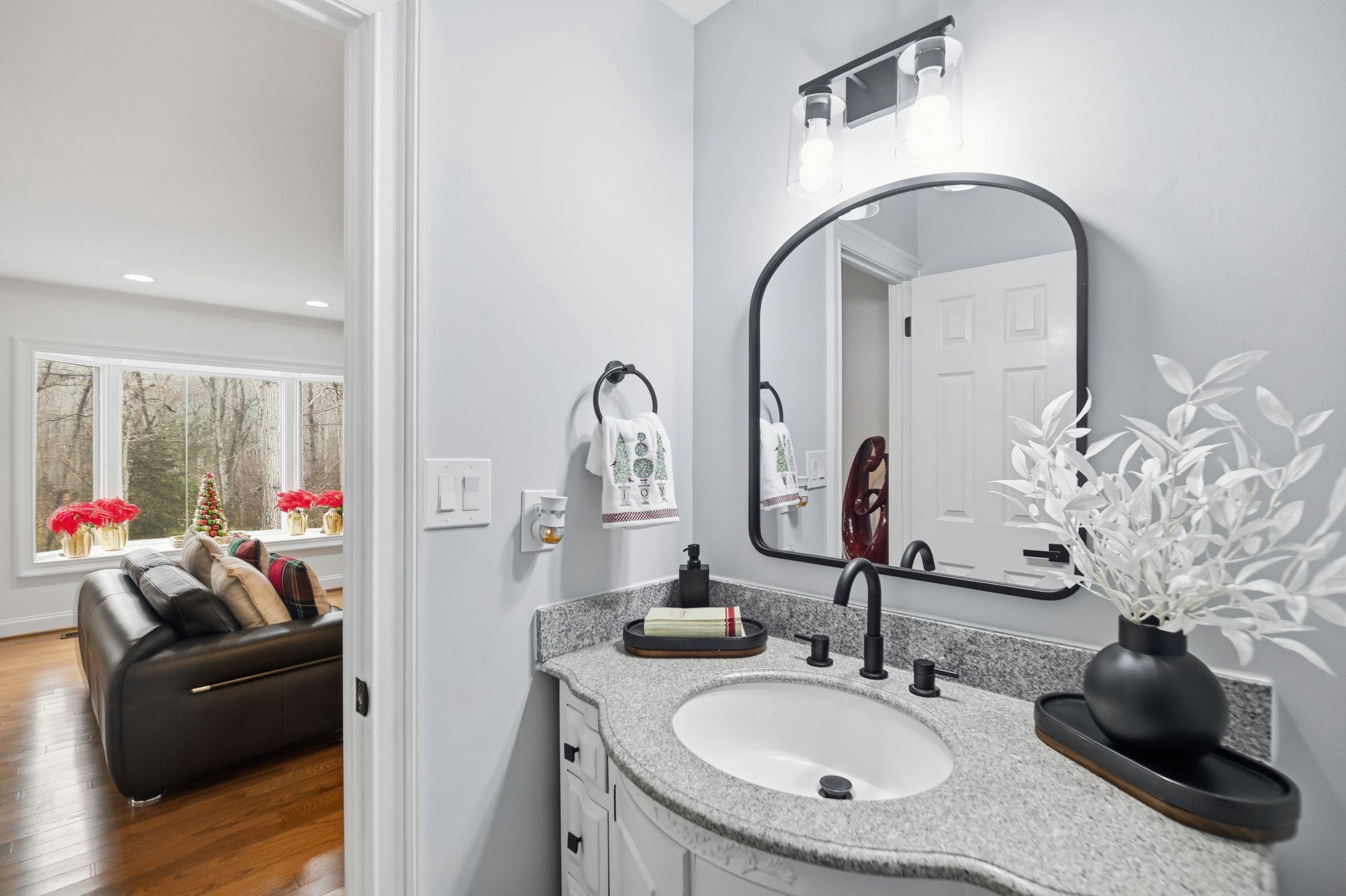 11728 Stuart Mill Road Oakton, VA 22124 - Photo 23 of 68 half bath on main floor