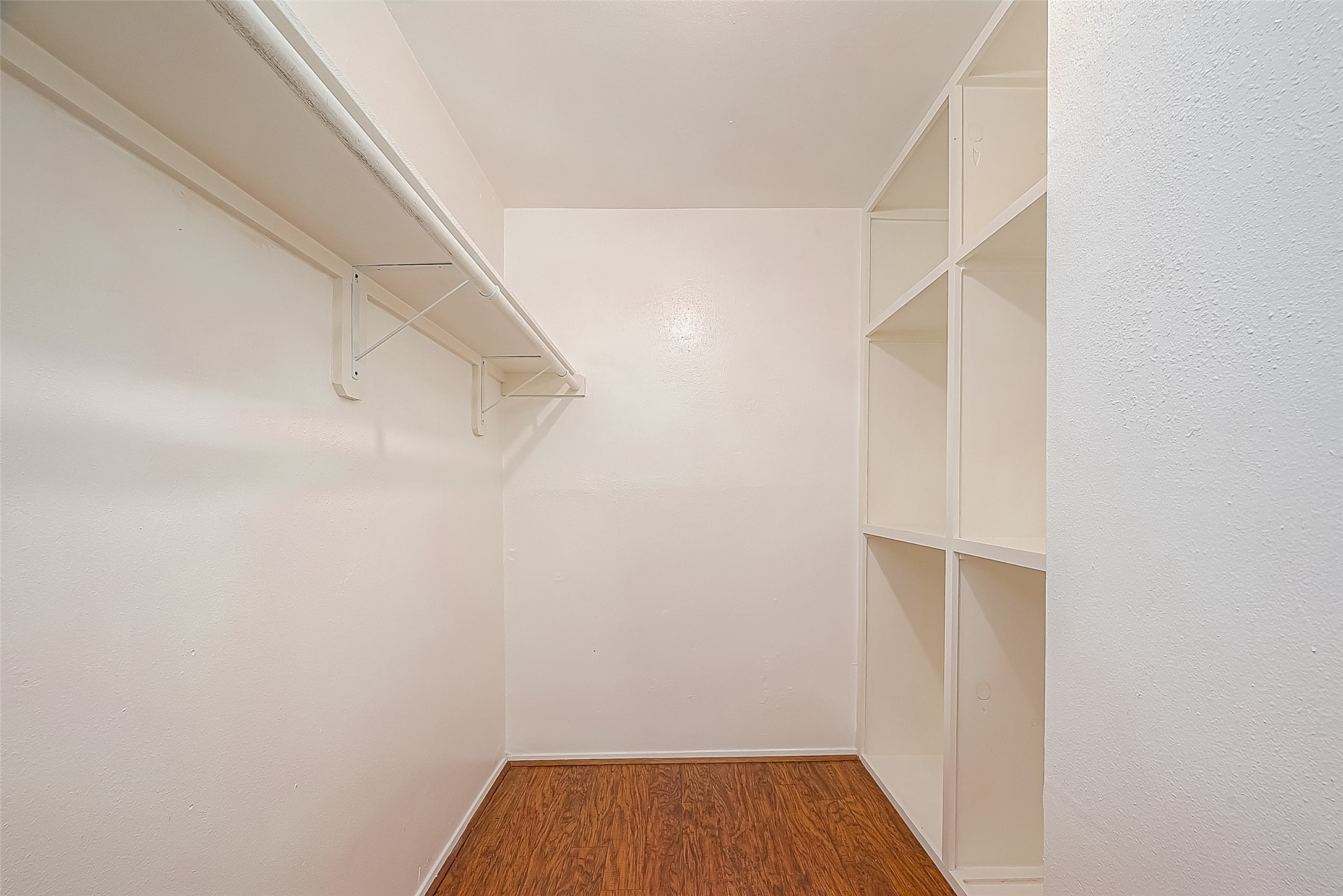 3224 Timmons Lane, Unit 147 Houston, TX 77027 - Photo 17 of 32 a view of small space with racks on the wall