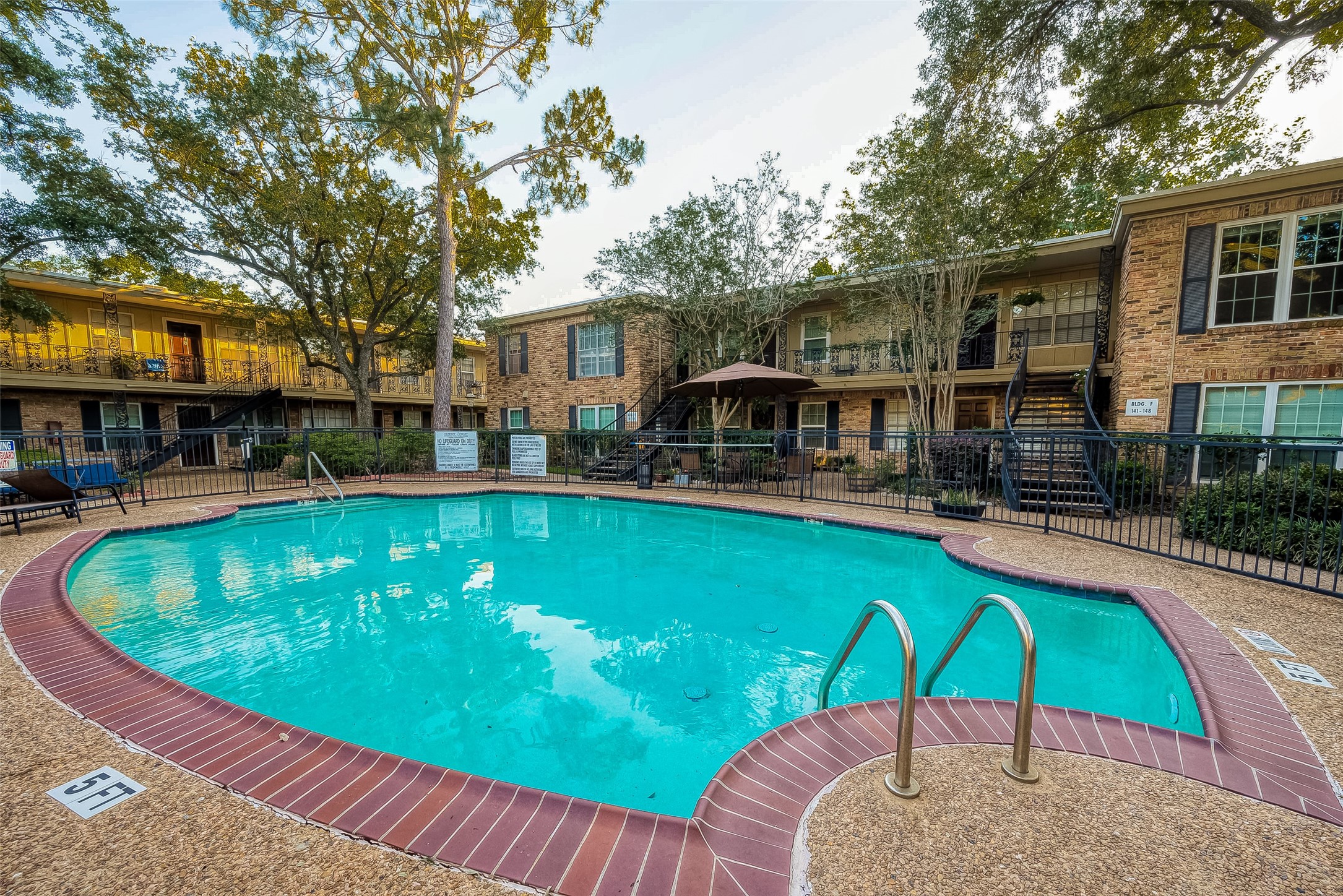 3224 Timmons Lane, Unit 147 Houston, TX 77027 - Photo 26 of 32 Enjoy a dipping the pool this summer that is convenient located just outside the unit!