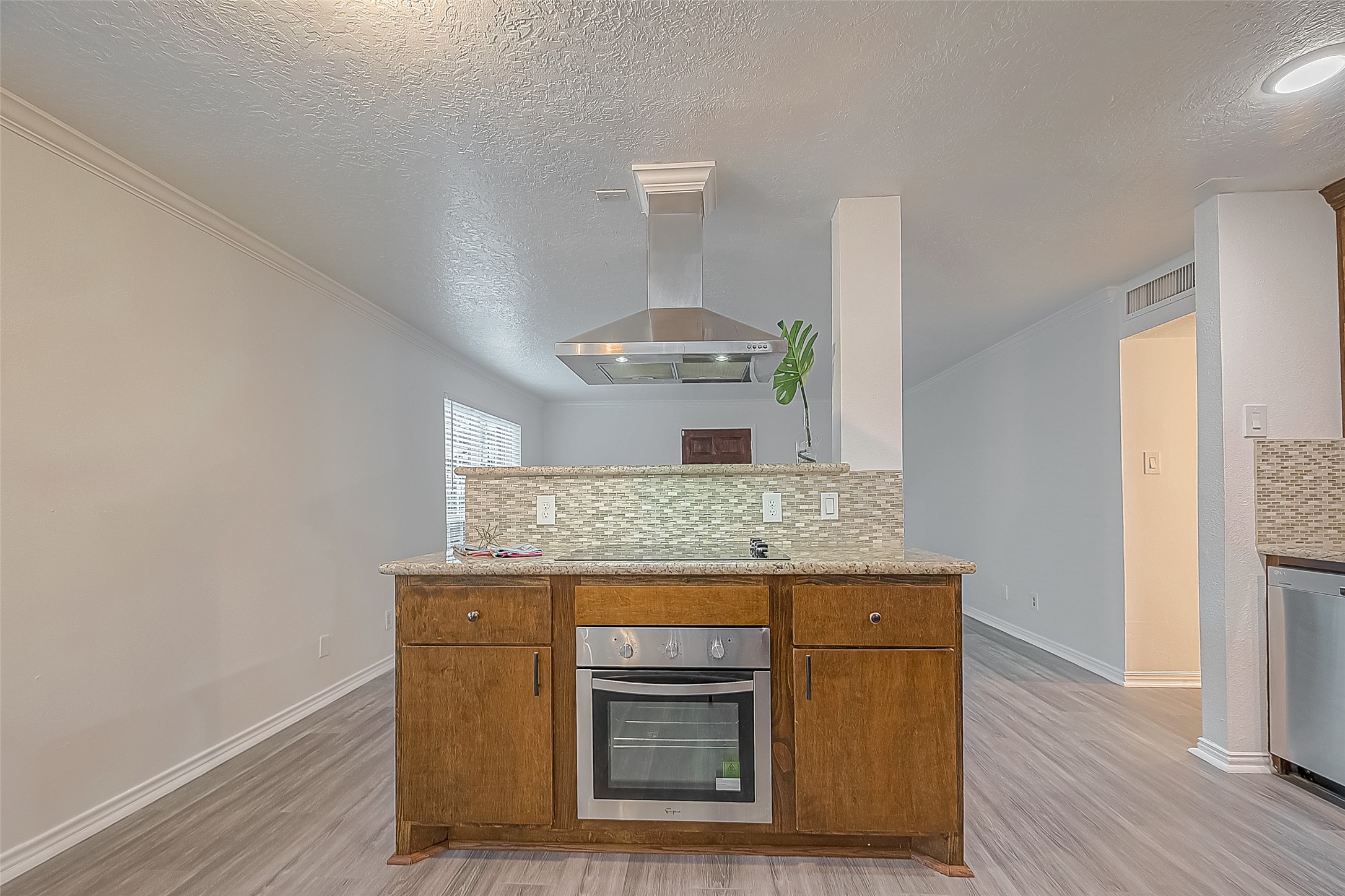 3224 Timmons Lane, Unit 147 Houston, TX 77027 - Photo 10 of 32 a hallway with washer and dryer
