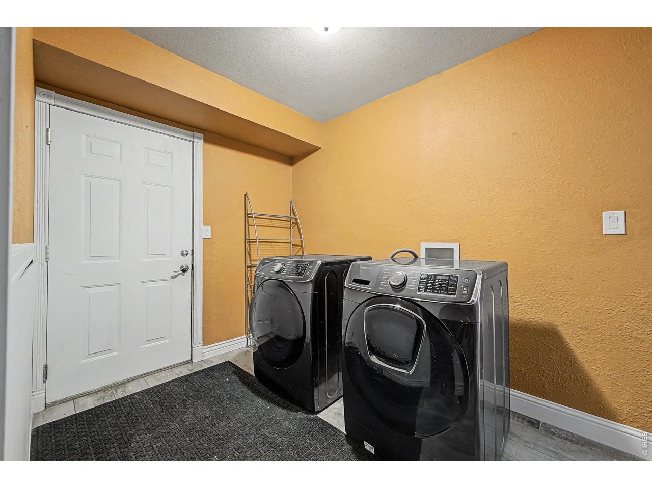 76 Highlands Drive Bailey, CO 80421 - Photo 36 of 49 a utility room with dryer and washer