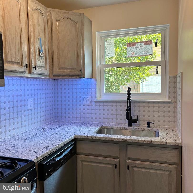 80 Via Cascata Drive Clementon, NJ 08021 - Photo 12 of 26 a kitchen with granite countertop a sink and a window