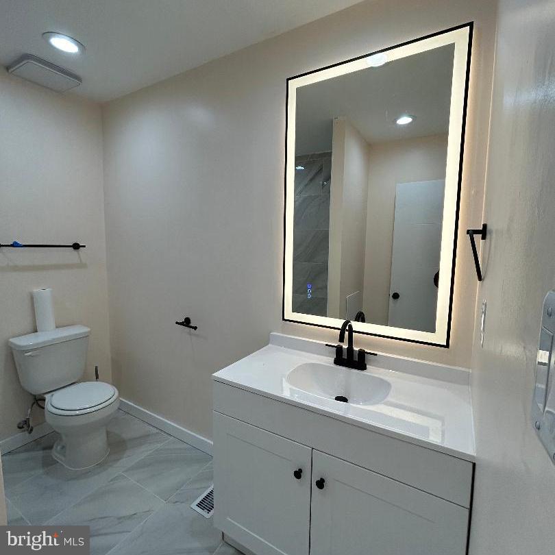 80 Via Cascata Drive Clementon, NJ 08021 - Photo 20 of 26 a bathroom with a sink toilet and mirror