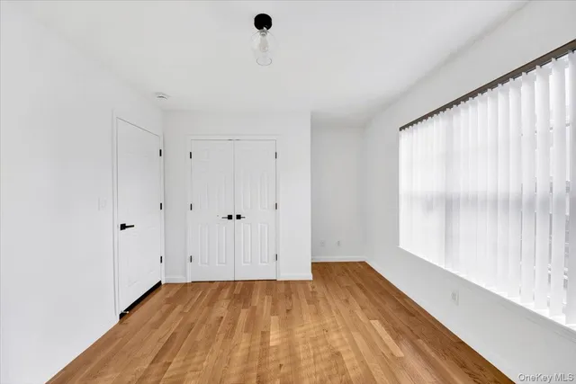 a bathroom with a toilet a sink and bathtub