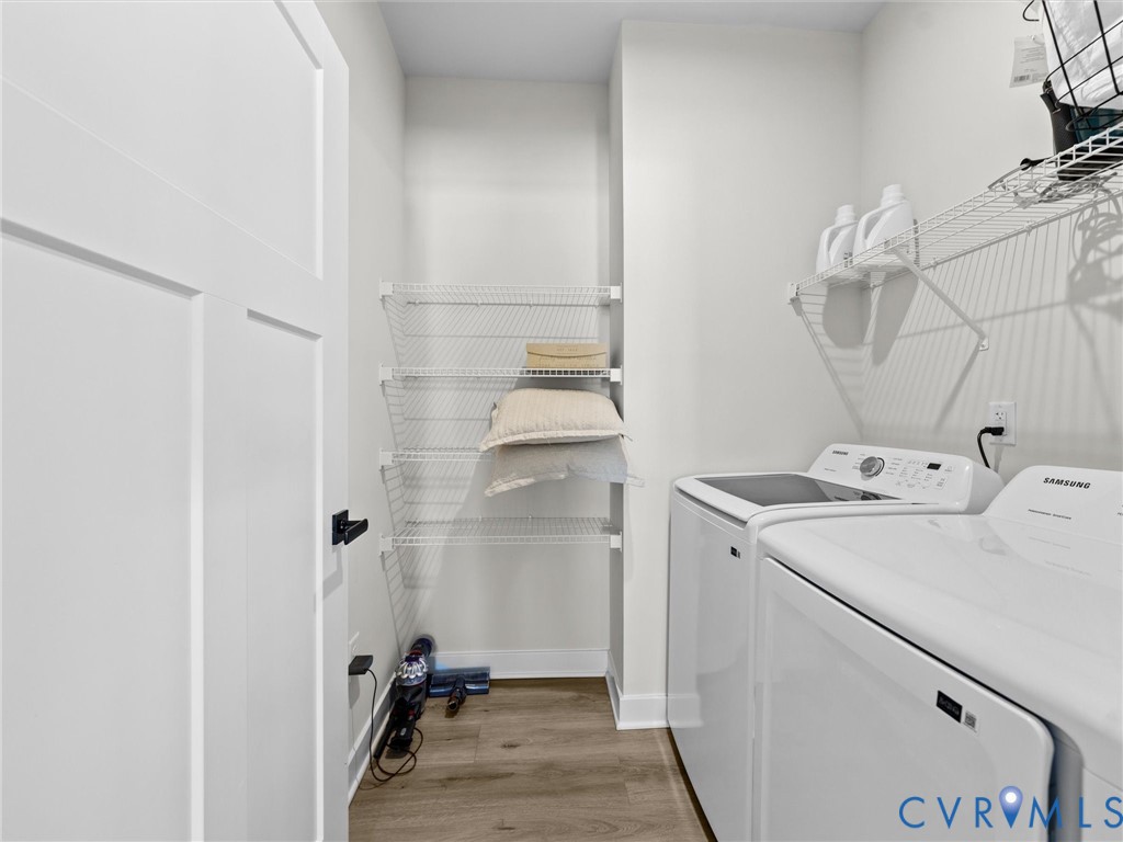 6230 Sheehan Crossing Moseley, VA 23120 - Photo 21 of 32 a utility room with dryer and washer
