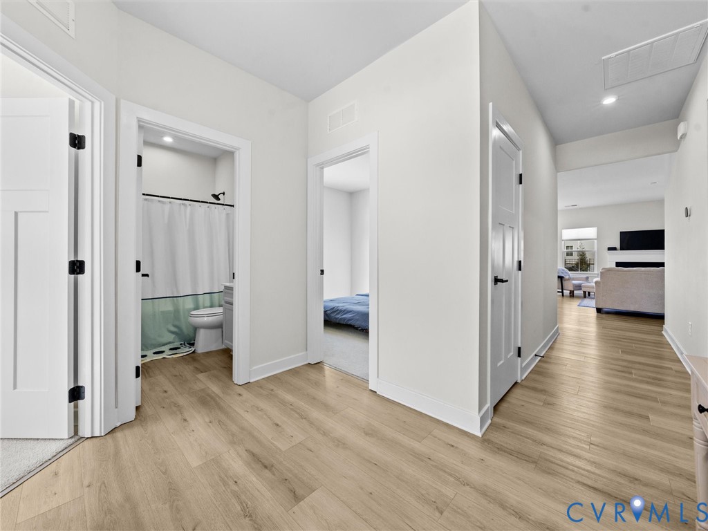 6230 Sheehan Crossing Moseley, VA 23120 - Photo 5 of 32 wooden floor and an empty room with wooden floor