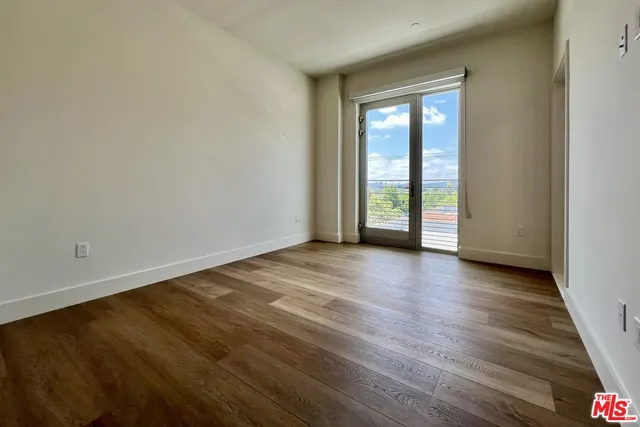 a bathroom with a double vanity sink toilet and shower