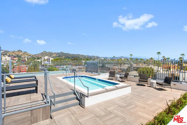 a view of a terrace with seating area